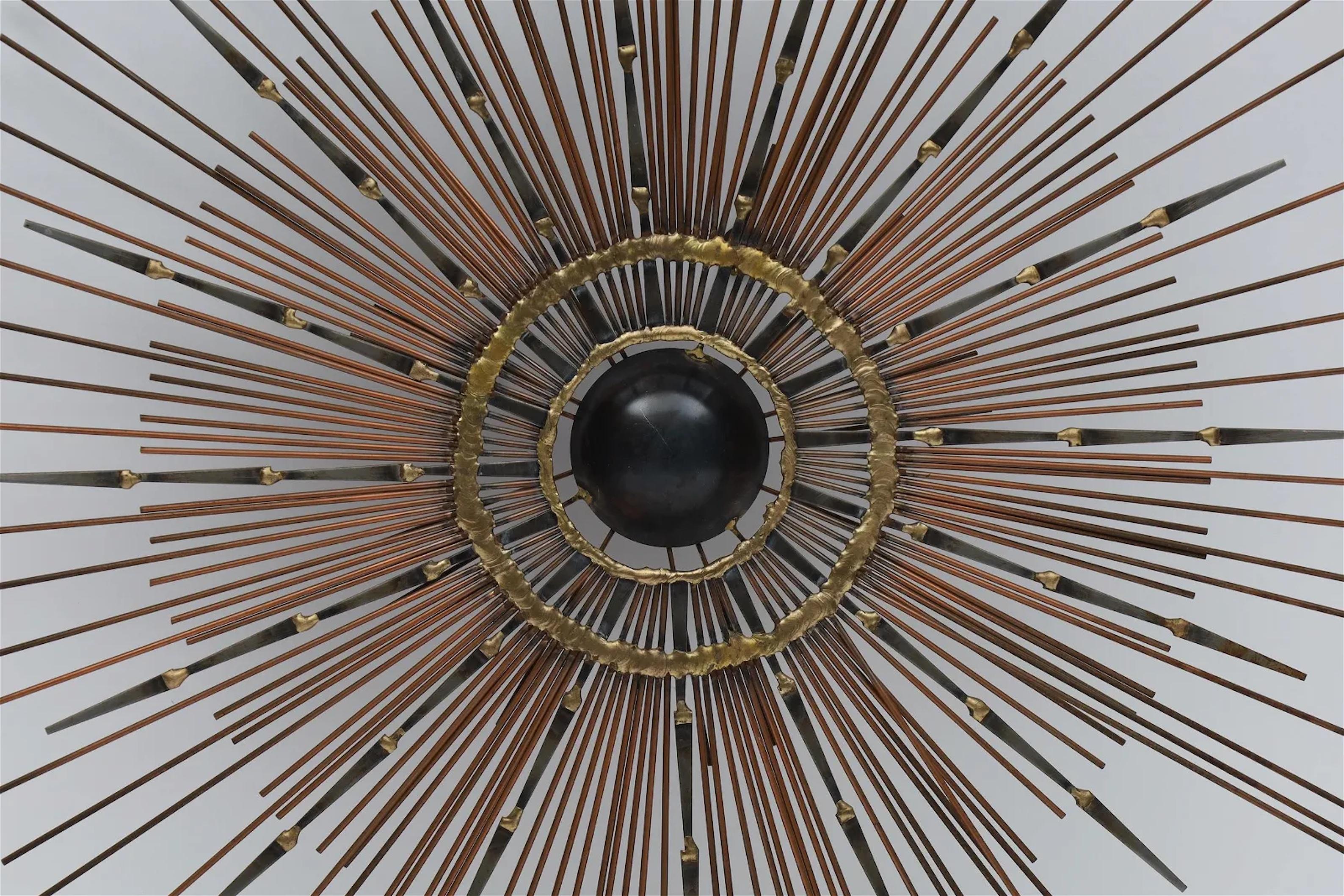 Canadian Steel and Brass Welded Sunburst Mirror For Sale