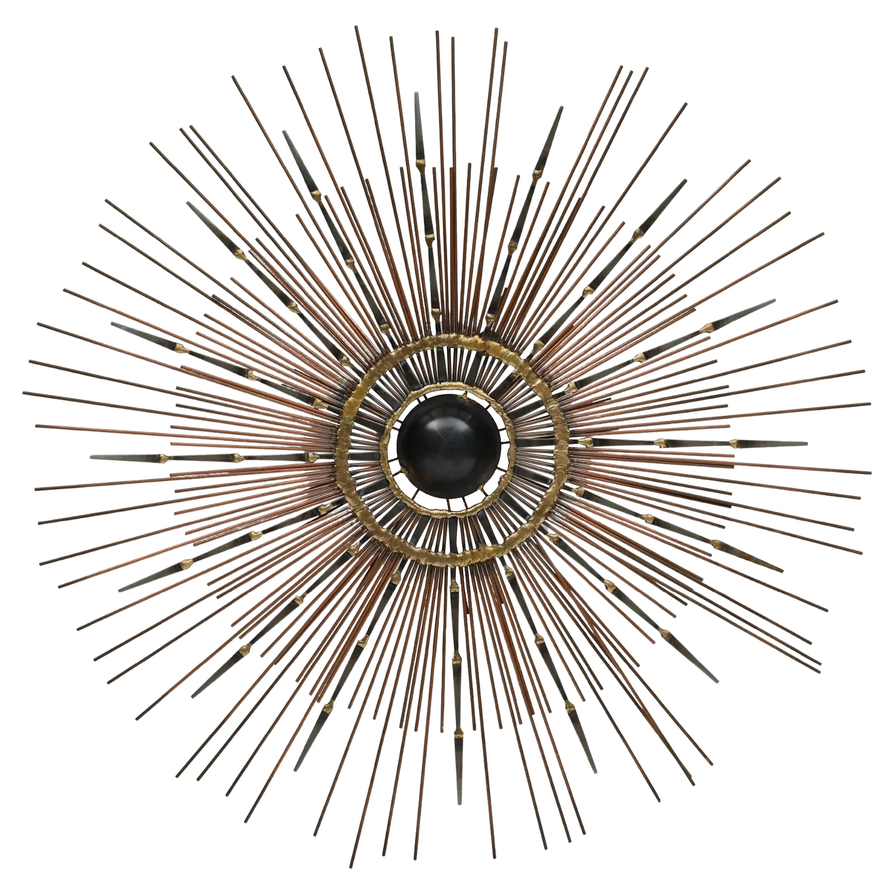 Espejo Sunburst de acero y latón soldado