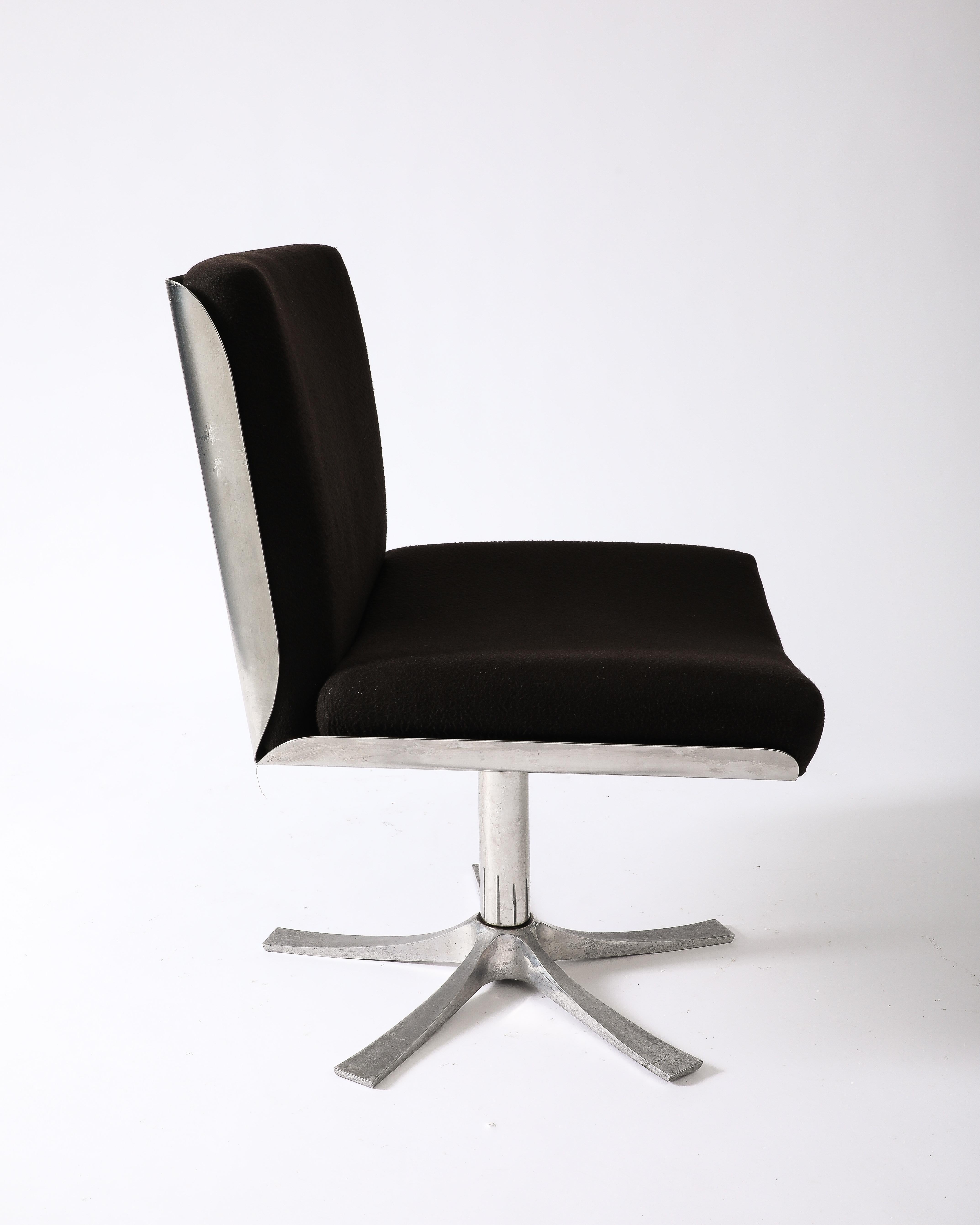 Sleek French armchair by celebrated designer Jacques Charpentier.
