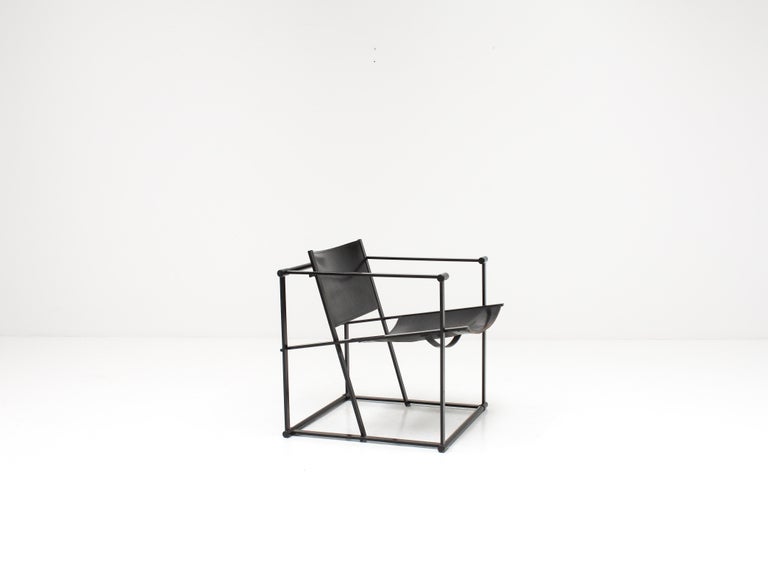 A steel and leather FM62 chair by Radboud Van Beekum for Pastoe, 1980s. 

Constructed from geometrically folded steel with bent ply seating. Inspired by the designs of Gerrit Rietveld and following the traditions of the De Stijl movement the cube