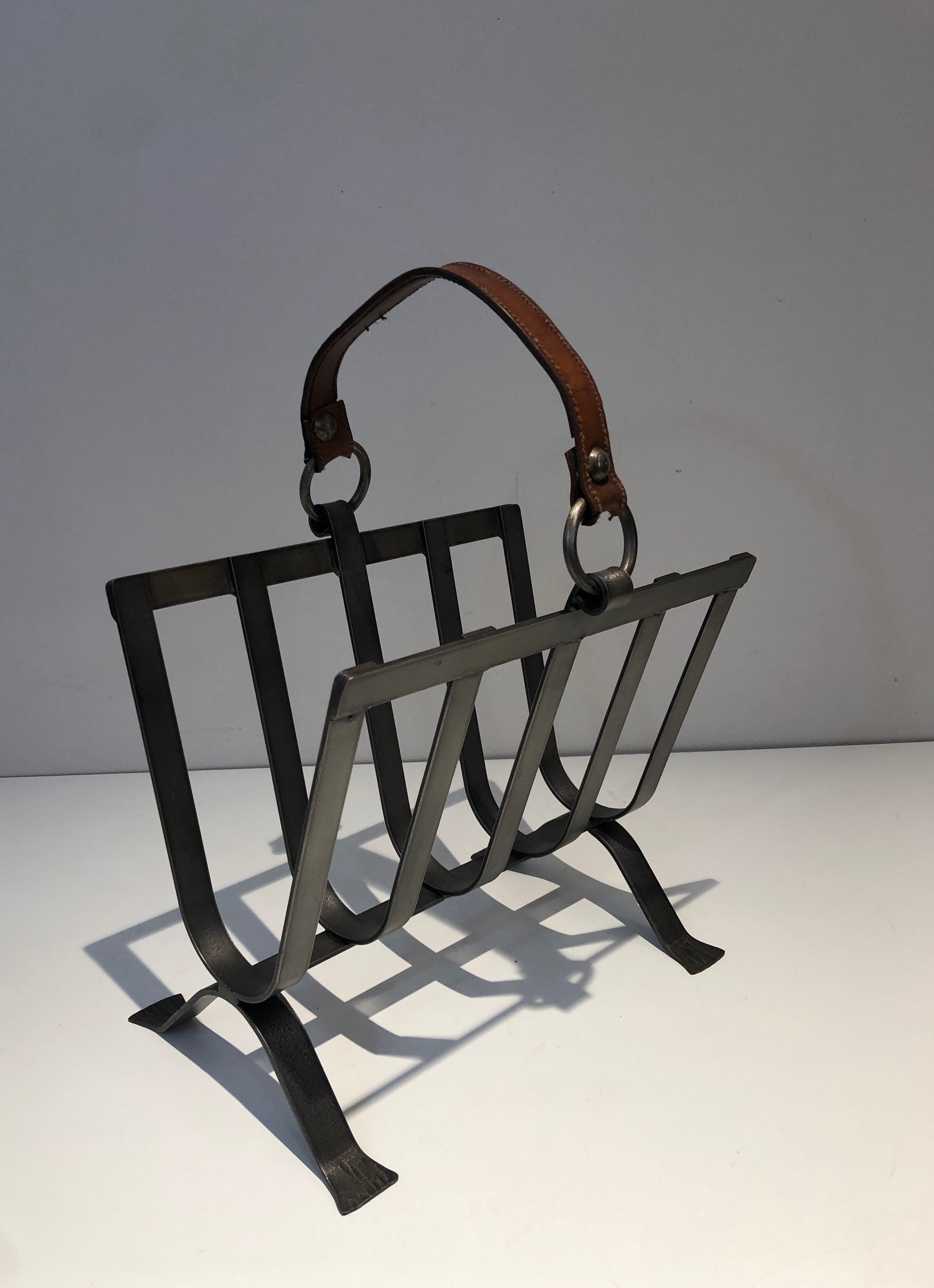 Steel and Leather Magazine Rack, French Work in the Style of Jacques Adnet For Sale