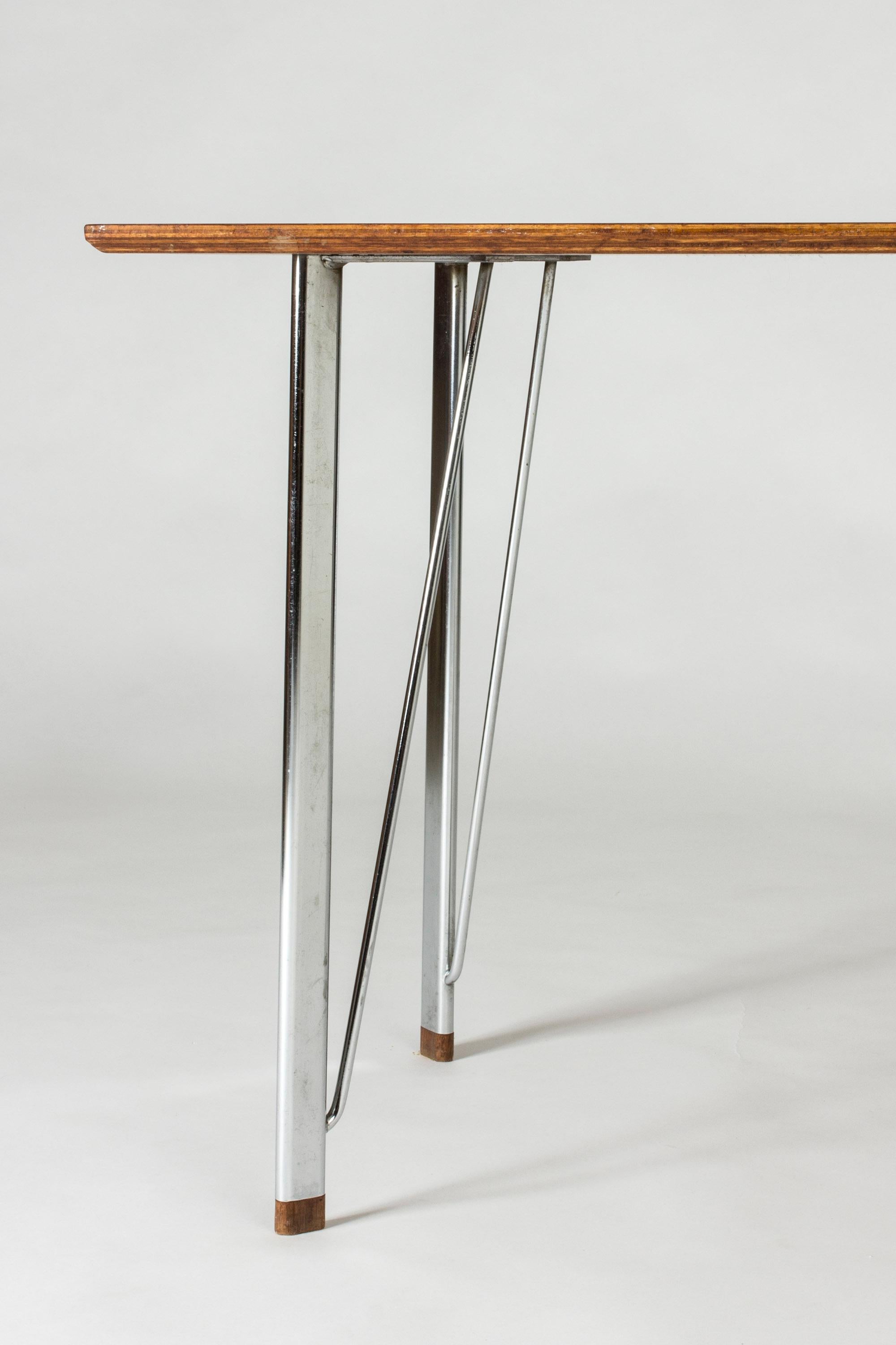 Scandinavian Modern Steel and Teak Desk by Arne Jacobsen for Fritz Hansen. Denmark, 1960s For Sale