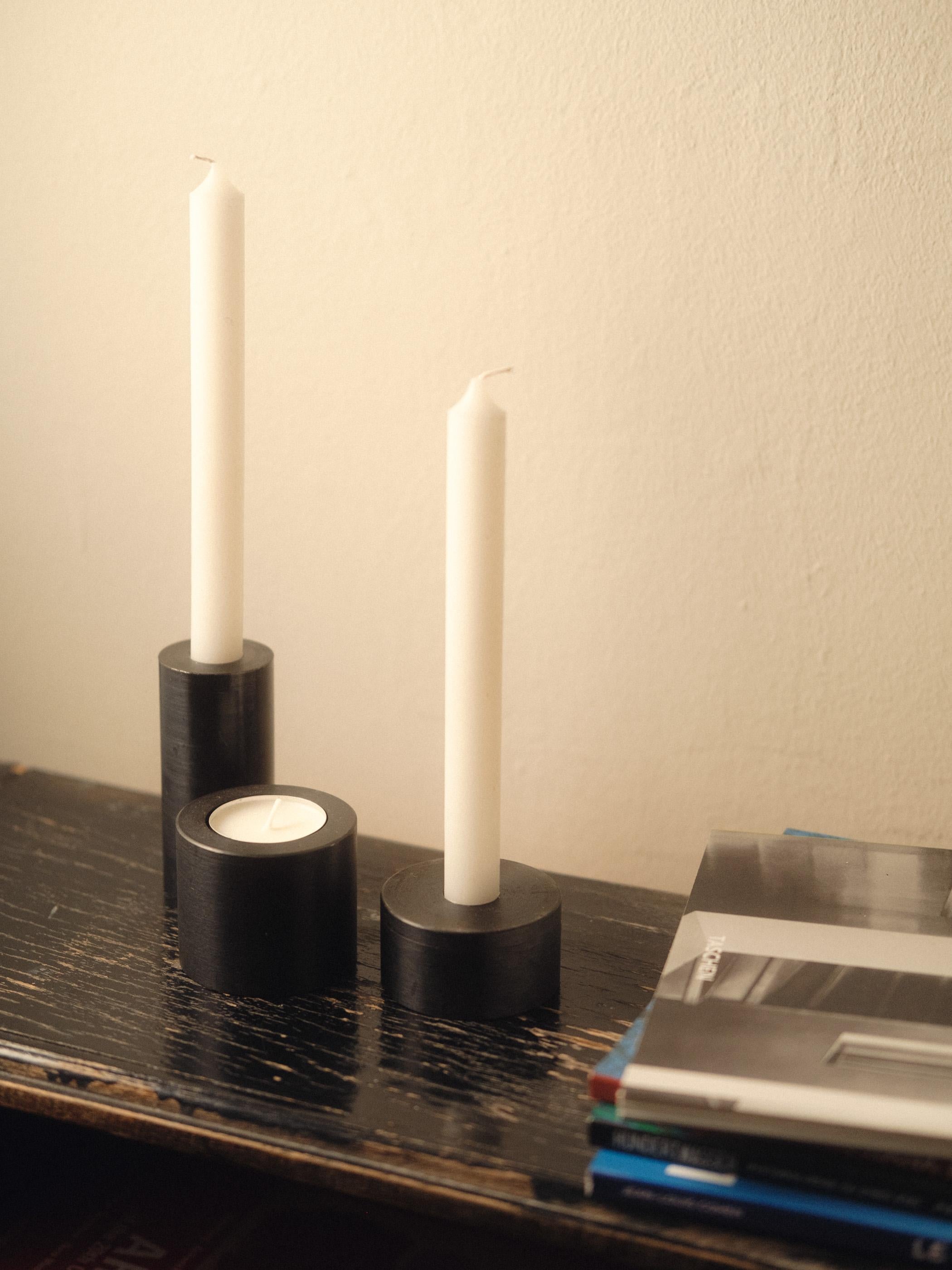 Steel another candleholder by Radu Abraham
Materials: Steel
Dimensions: D8 x H14cm

3 piece candle holder; can be used with multiple types of candles or with standard candle pill; if detached from each other, each element can be used as a small