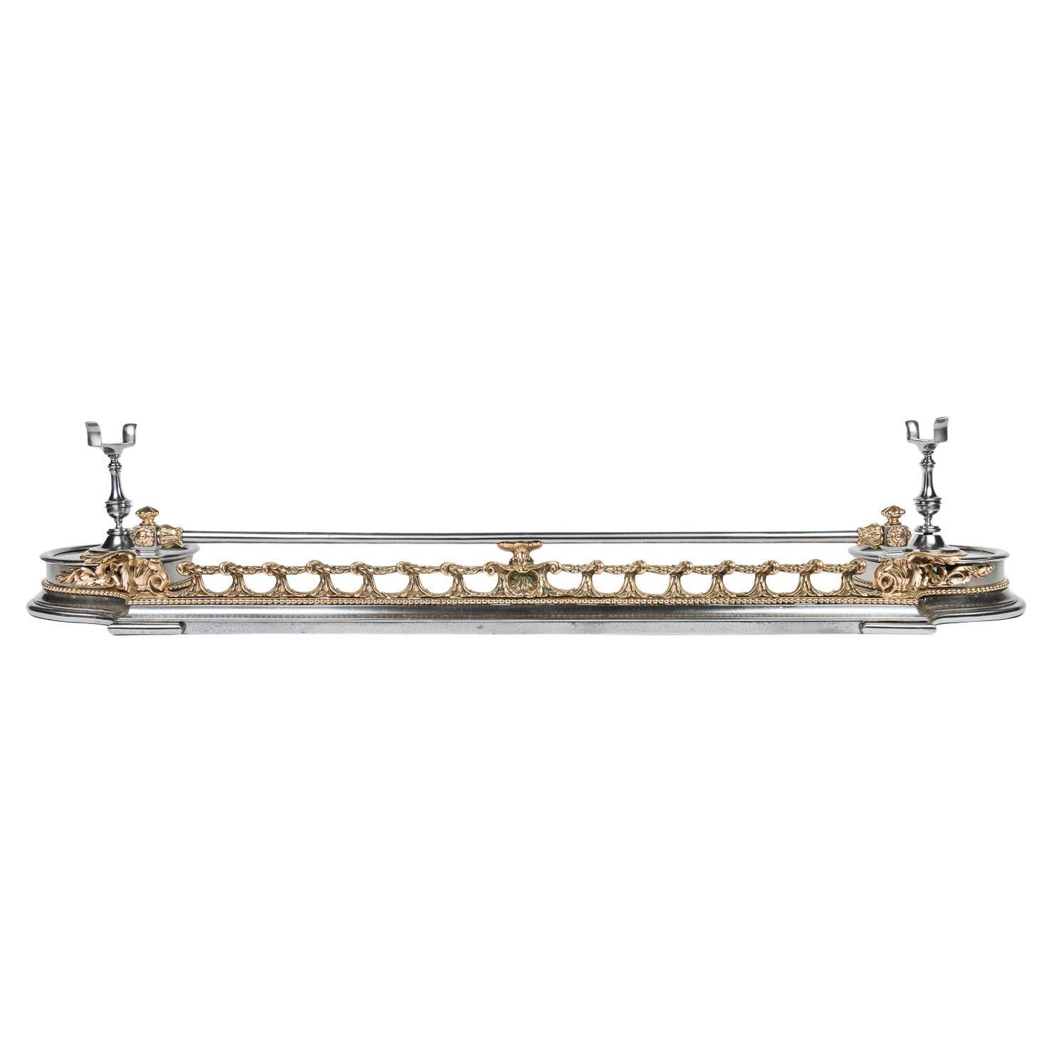 Steel & bronze fireplace fender with rests for fire tools