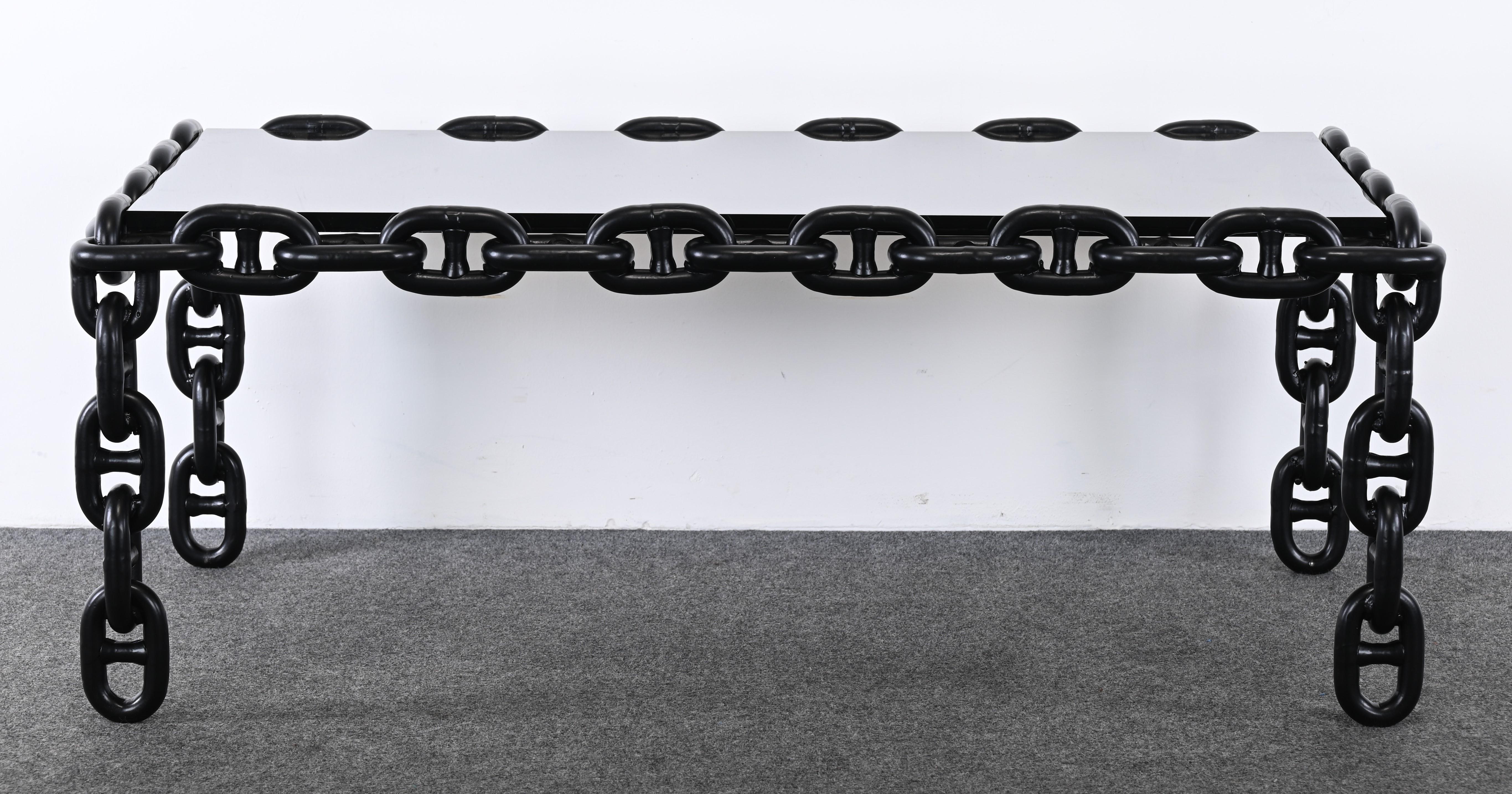 A handsome Mid-Century Modern welded steel coffee table powder coated in matte black finish and ready to place. The top is made of original smoked plexiglass or acrylic. Some scratches to the surface as shown in the images. The surface has been