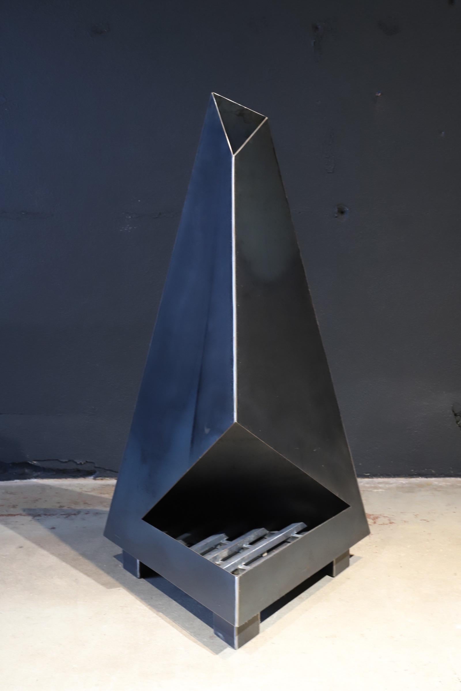 Not your normal chiminea or fireplace. This high design, raw steel sculptural piece will make a statement in any outdoor space. Functionally, it is perfect on that cold evening, but also serves as an amazing art display the remainder of the year.