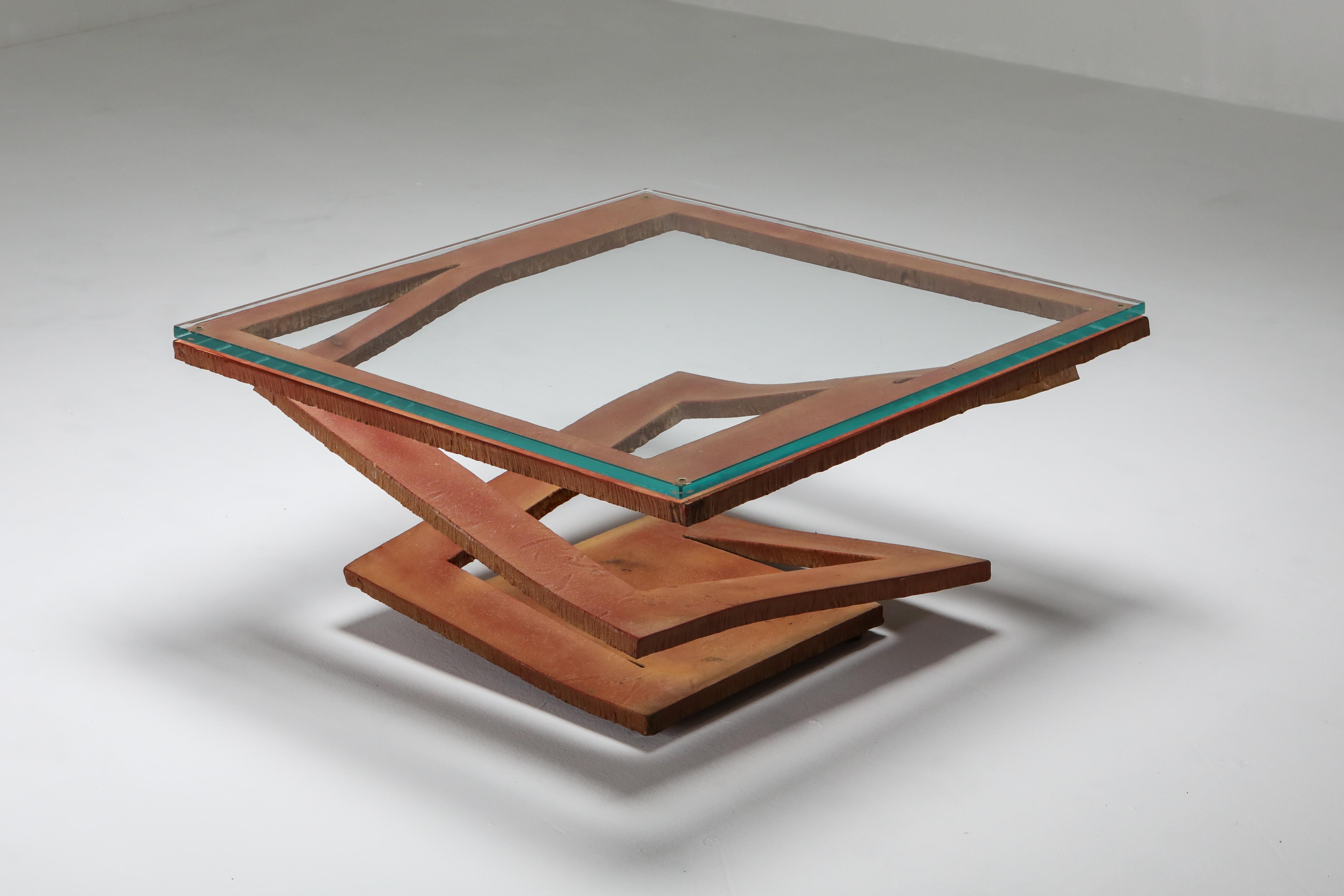 Roche Bobois, corten steel coffee table, Maurice Barilone, Italy, 1980s

Unusual coffee table, perceived from a steel square which through cut-outs spirals up to the top.
Creating an Escher like trompe-l'oeil effect.
Would fit well in a Kelly