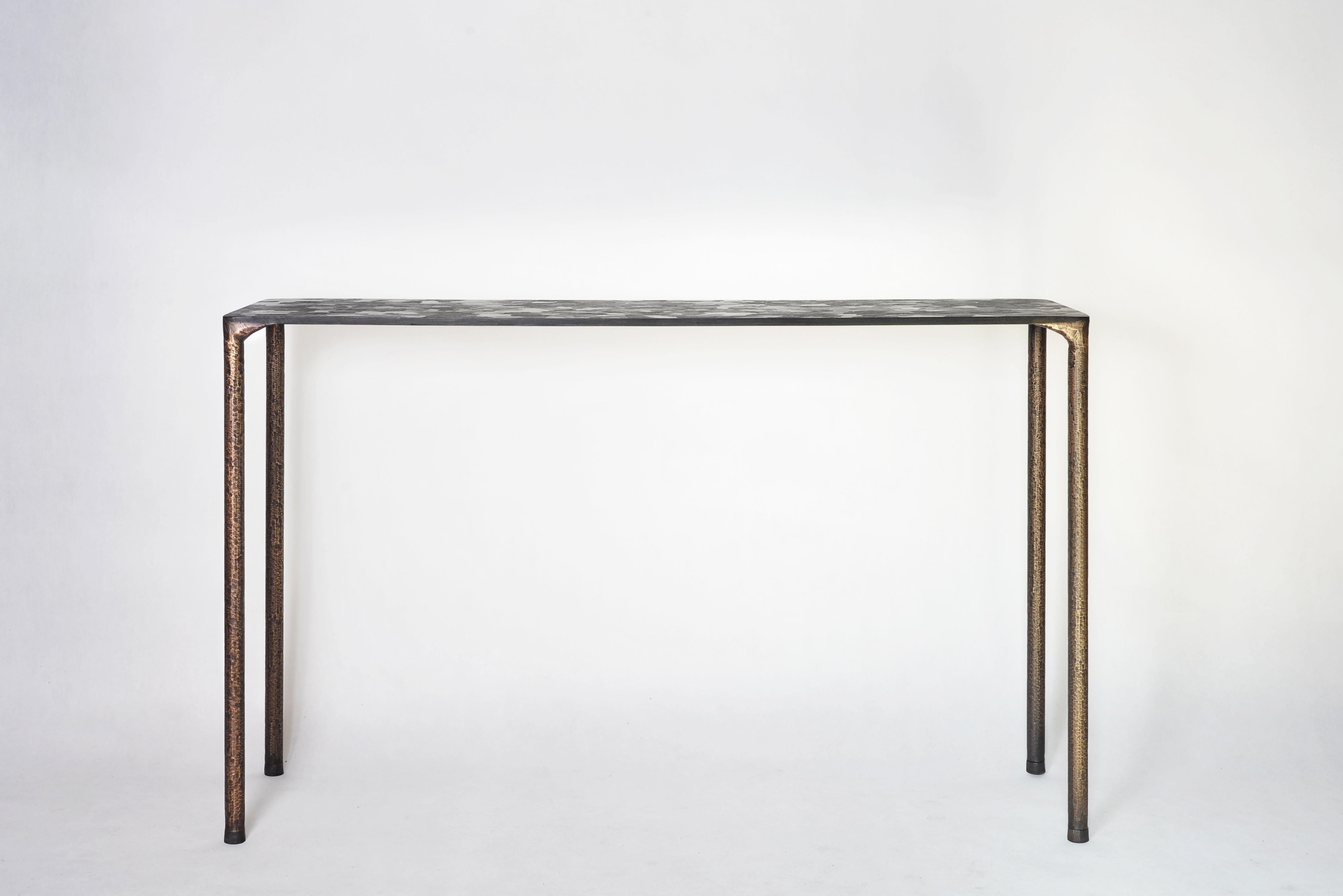 Steel console by Lukasz Friedrich
Dimensions: 127 x 35 x H 78 cm
Materials: Steel
Dimensions are fully customizable.


Lukasz Friedrich (born 1980), lives and works in Warsaw. He is a self-taught
designer and craftsman. Lukasz grew up in and