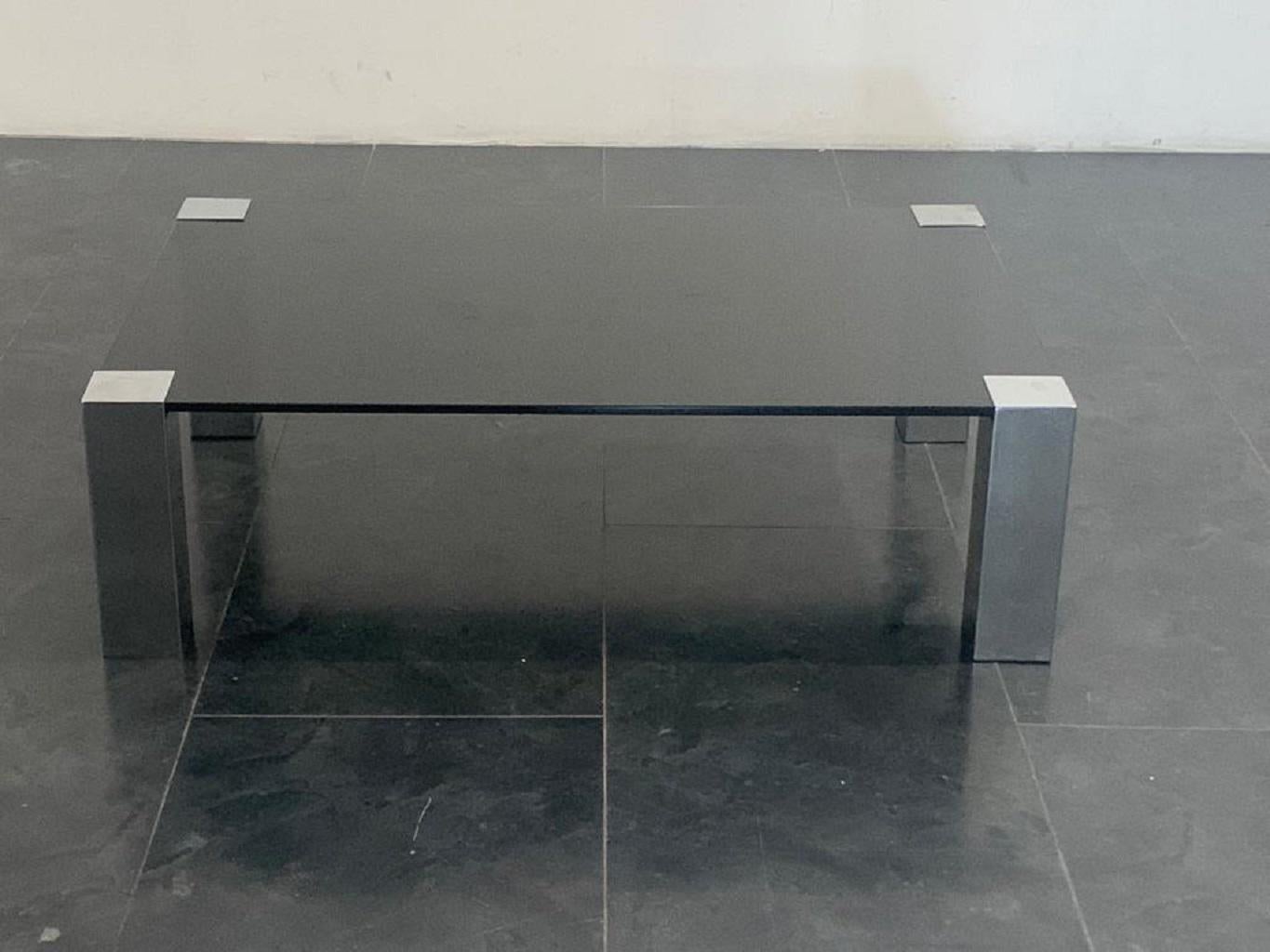 CIDUE steel coffee table with anthracite colored crystal.
Packaging with bubble wrap and cardboard boxes is included. If the wooden packaging is needed (fumigated crates or boxes) for US and International Shipping, it's required a separate cost