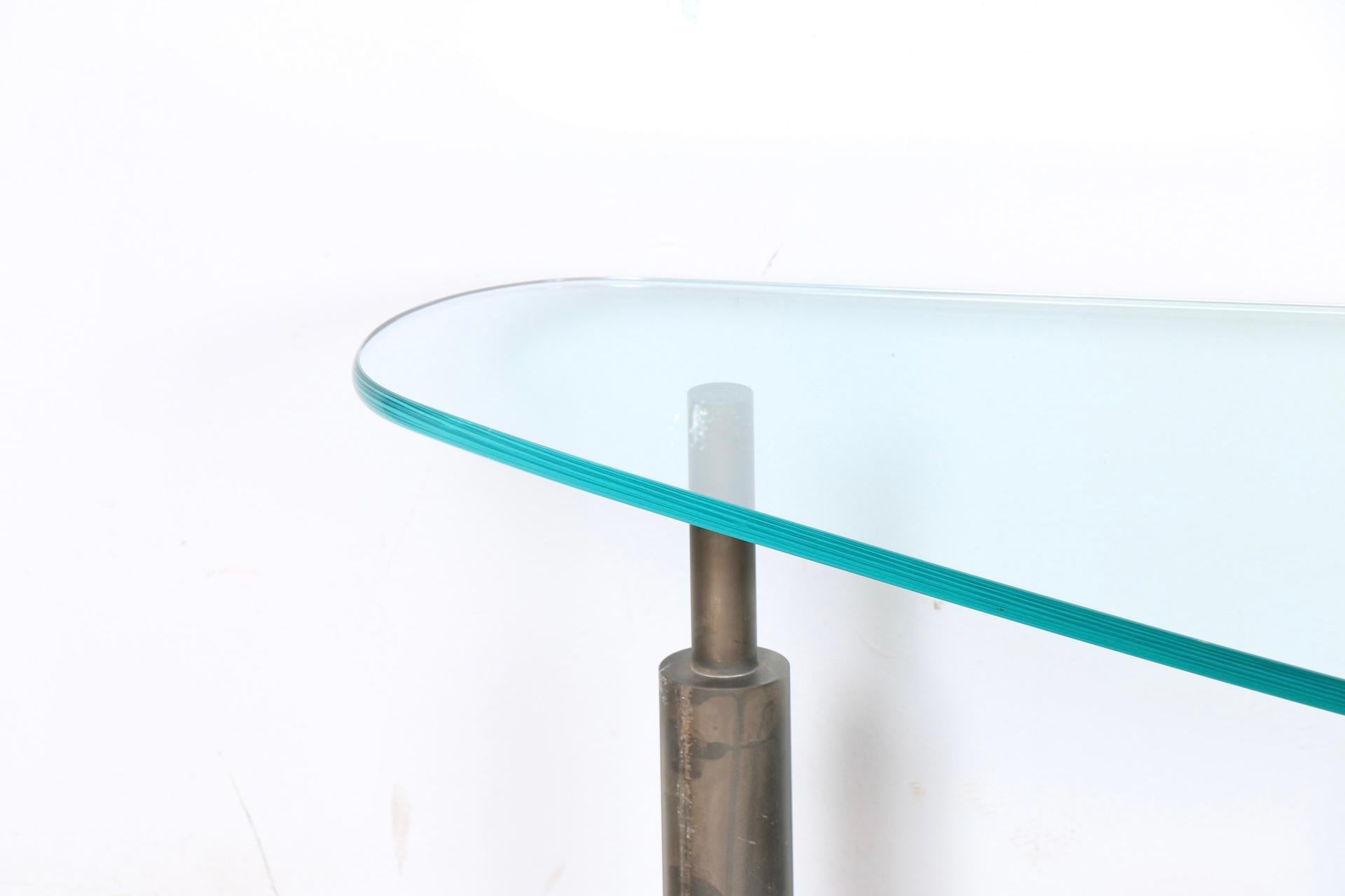 Unique beautiful 2 piece steel cut base table with amazing cut and shaped glass tops. Adjust and are moveable. No broken parts or chips.