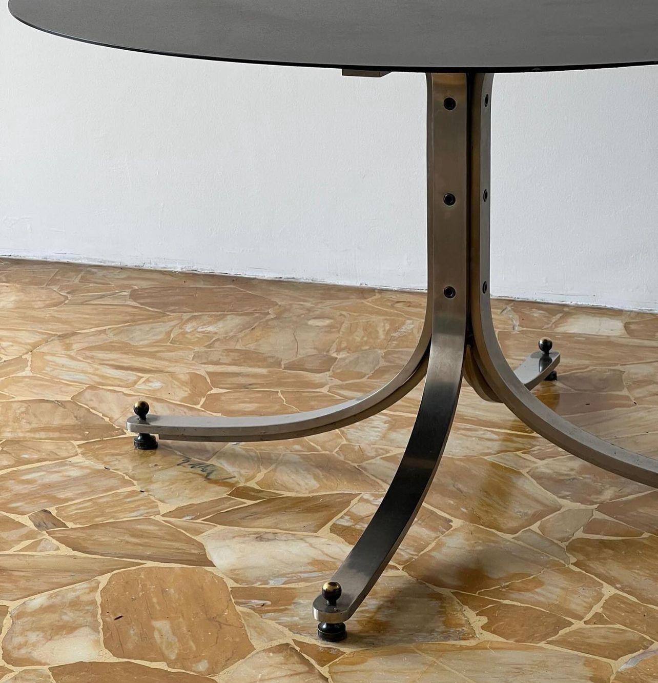 Sculptural Dining Table - Italian Collectible Design - Sergio Mazza Stainless Steel Table

Beautiful and timeless dining table designed by Sergio Mazza for Italian furniture brand Arflex in 1962. The four legs are made in brushed stainless steel,