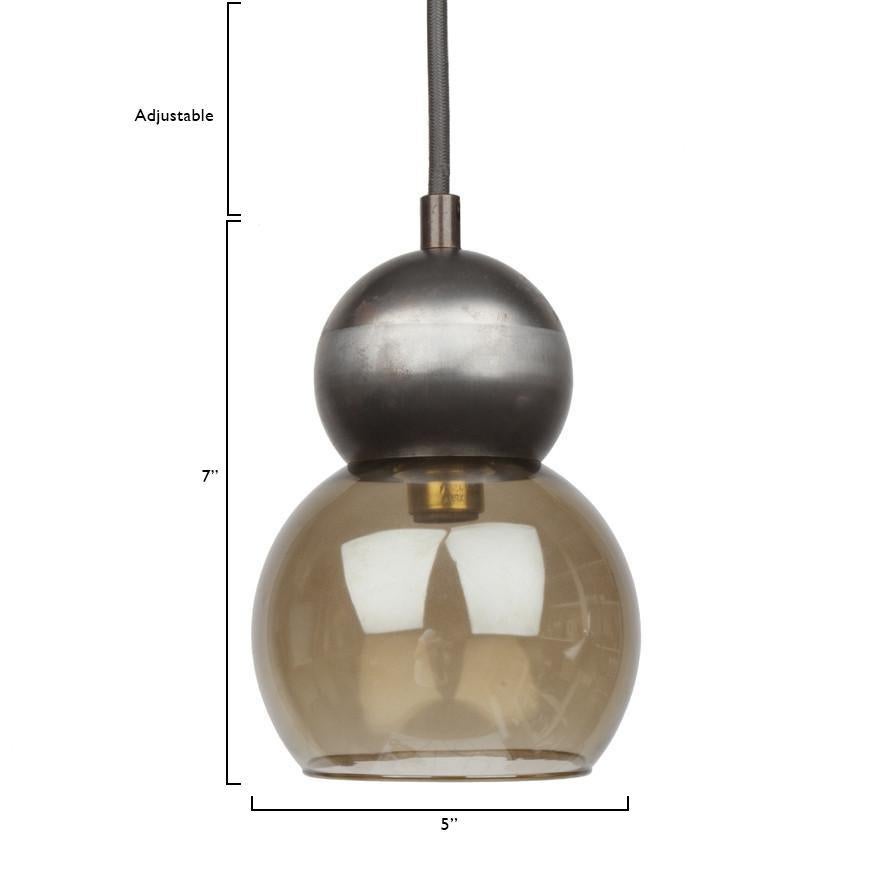 A modern pendant light to accent your kitchen, bathroom or any interior. This contemporary lighting pendant also works well in a commercial setting restaurant, retail, or office space.
Designed by Michele Varian
Steel and glass 
Overall product