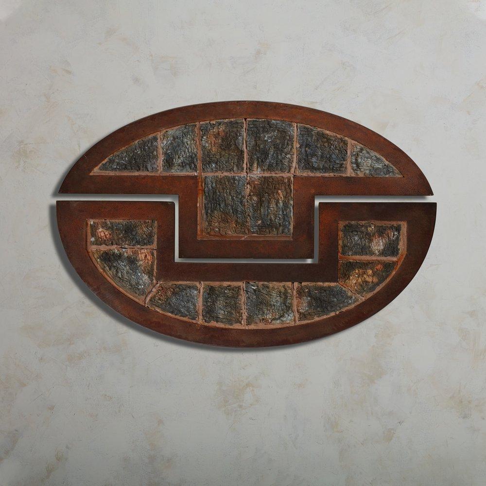 A large scale vintage wall sculpture consisting of two interlocking demilune steel frames with rich oxidation. Each frame has a beautiful ceramic tile pattern with a hand etched finish in deep terra cotta, gray and blue hues. Unsigned. 20th