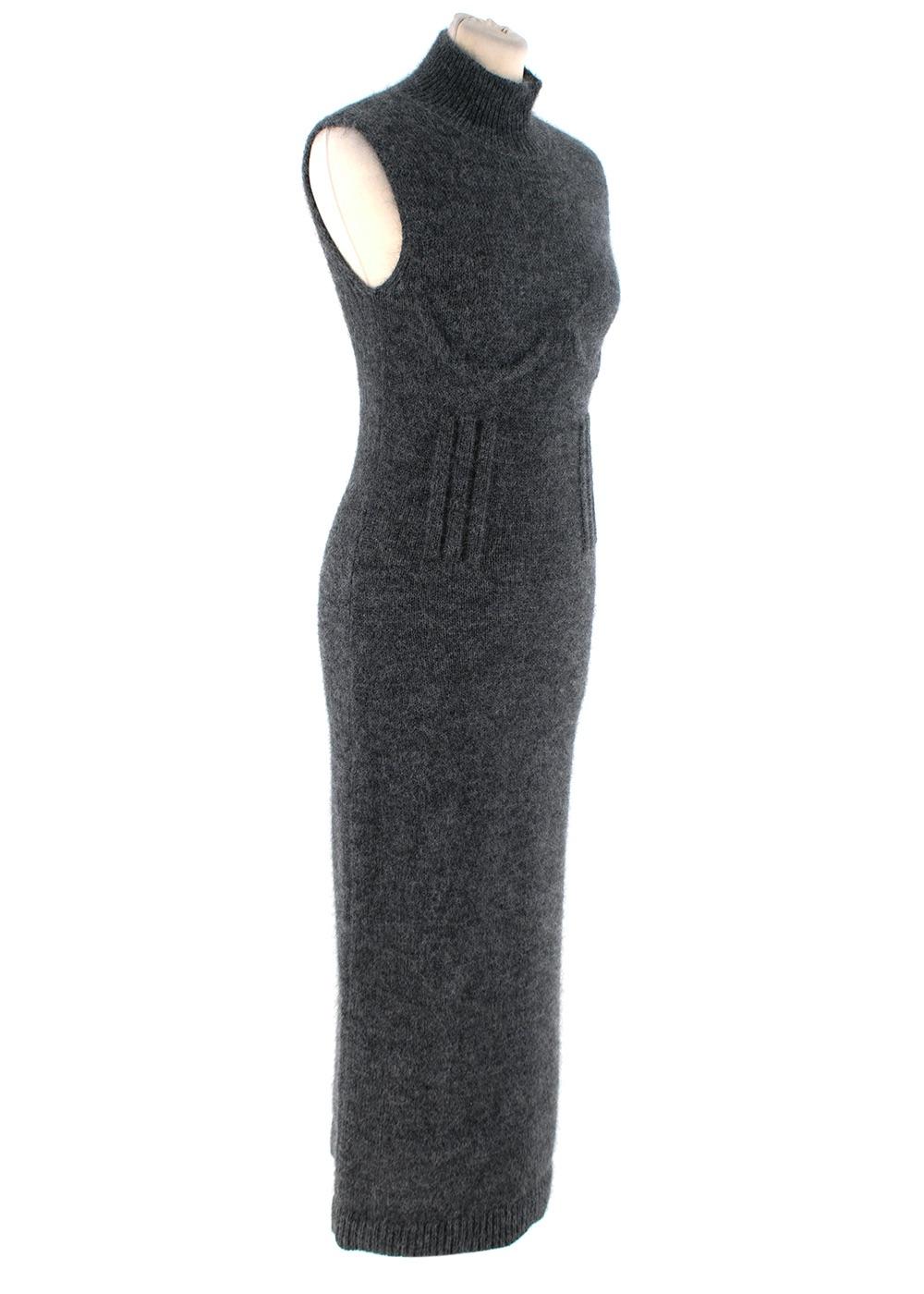 Fendi Steel Grey Seamed Cashmere Knitted Dress

- Mock neck, form-fitting sleeveless dress with seamed underbust cups and faux-boning around the waistline
- Mid-calf length 
- Mid-weight knit 
- Unlined 

Materials
57% Cashmere
28% Mohair wool
13%