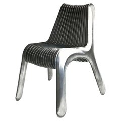 Steel in Rotation Chair by Zieta