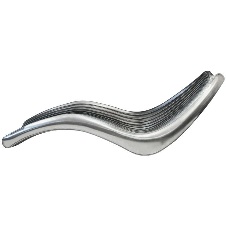 Steel in Rotation Chaise Lounge in Polished Stainless Steel, Zieta