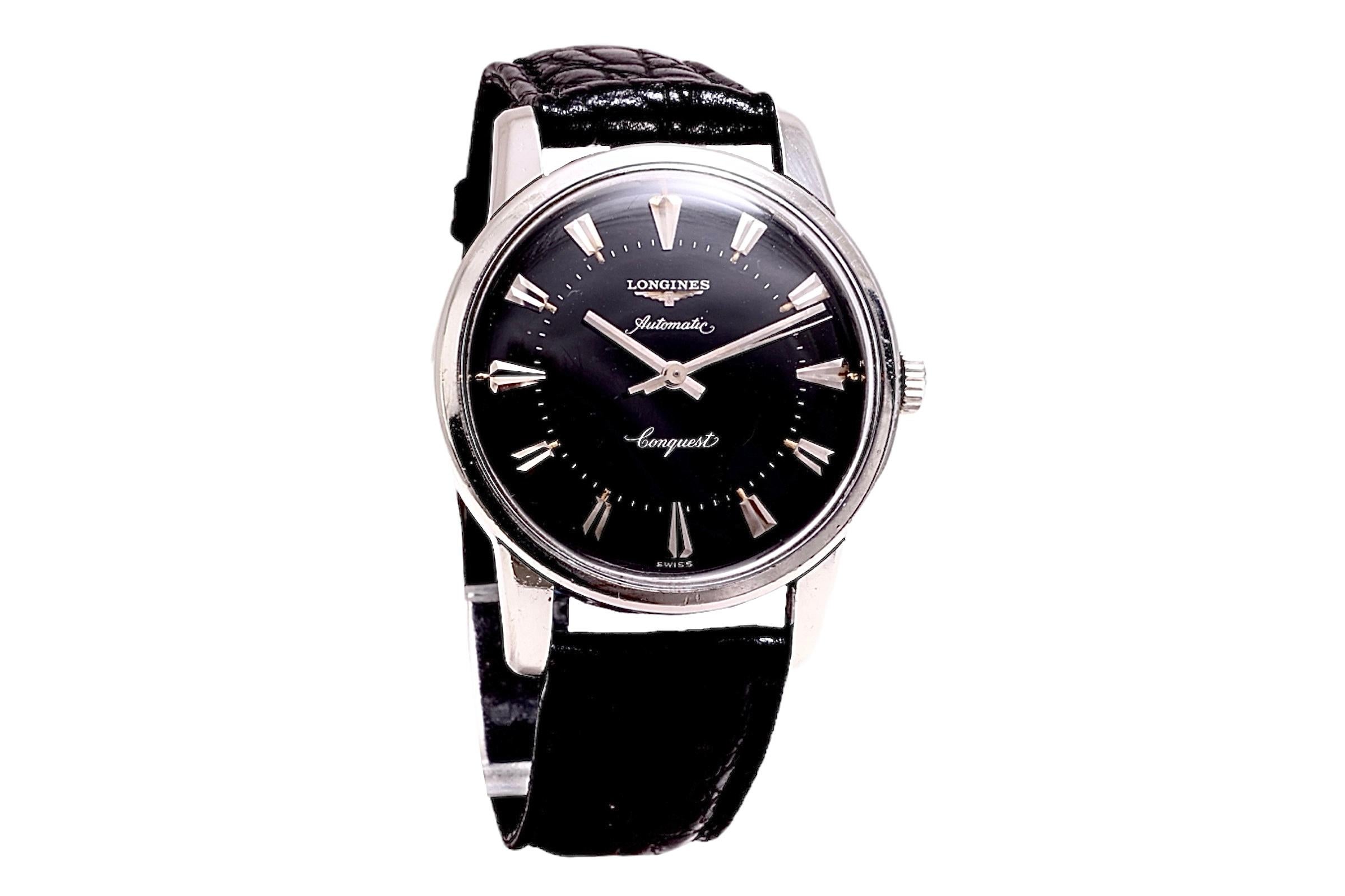 Steel Longines Conquest Automatic Collectors Wrist Watch, Reference 9000, Gilt Dial

Movement : Mechanical with Automatic winding , Caliber 19 AS

Case : Stainless Steel , 34.8 mm

Total weight including strap : 47.4 gram

Description
Longines