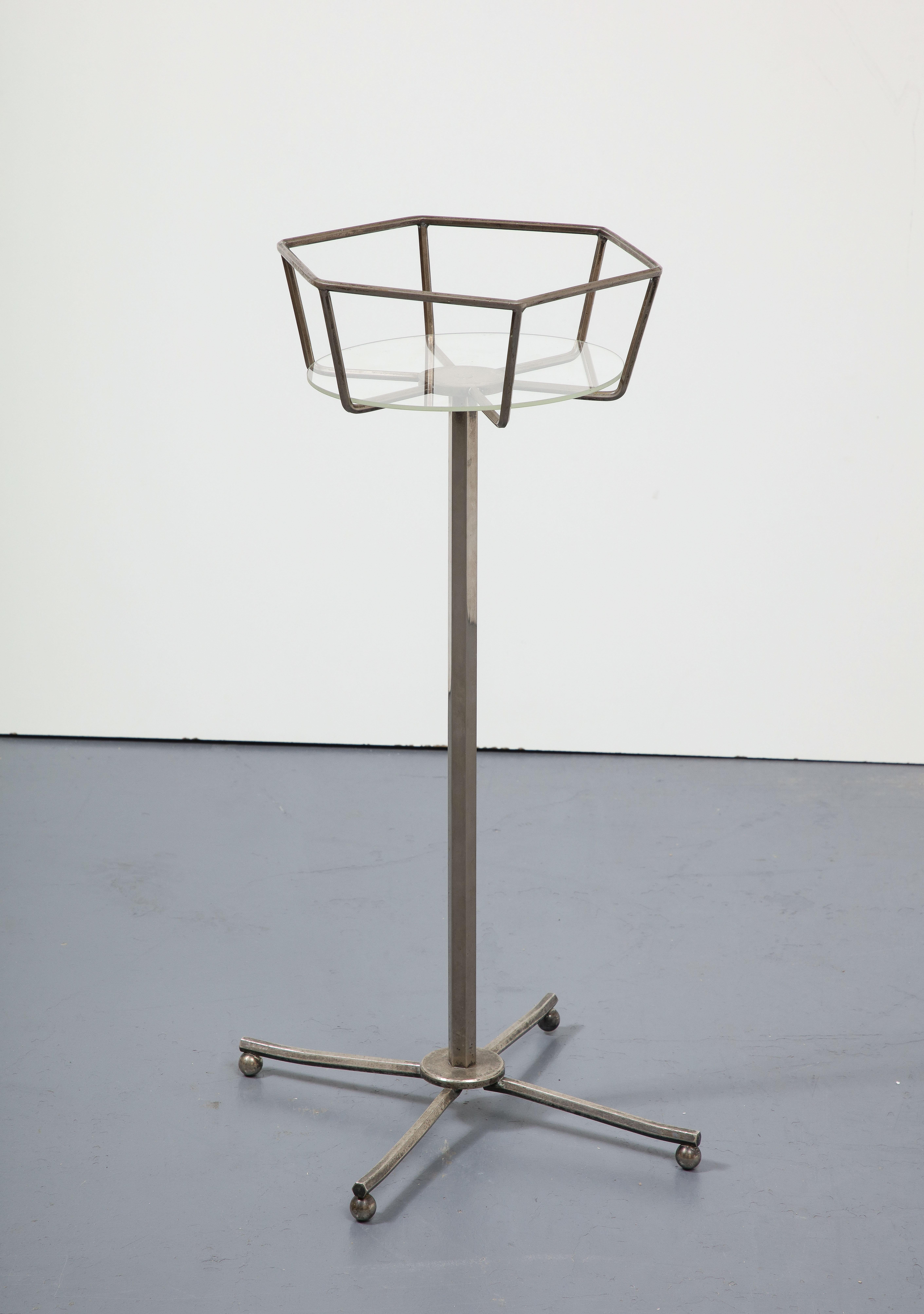 Chic metal and lucite stand that could be used to either hold an ice/champagne bucket or plant stand.