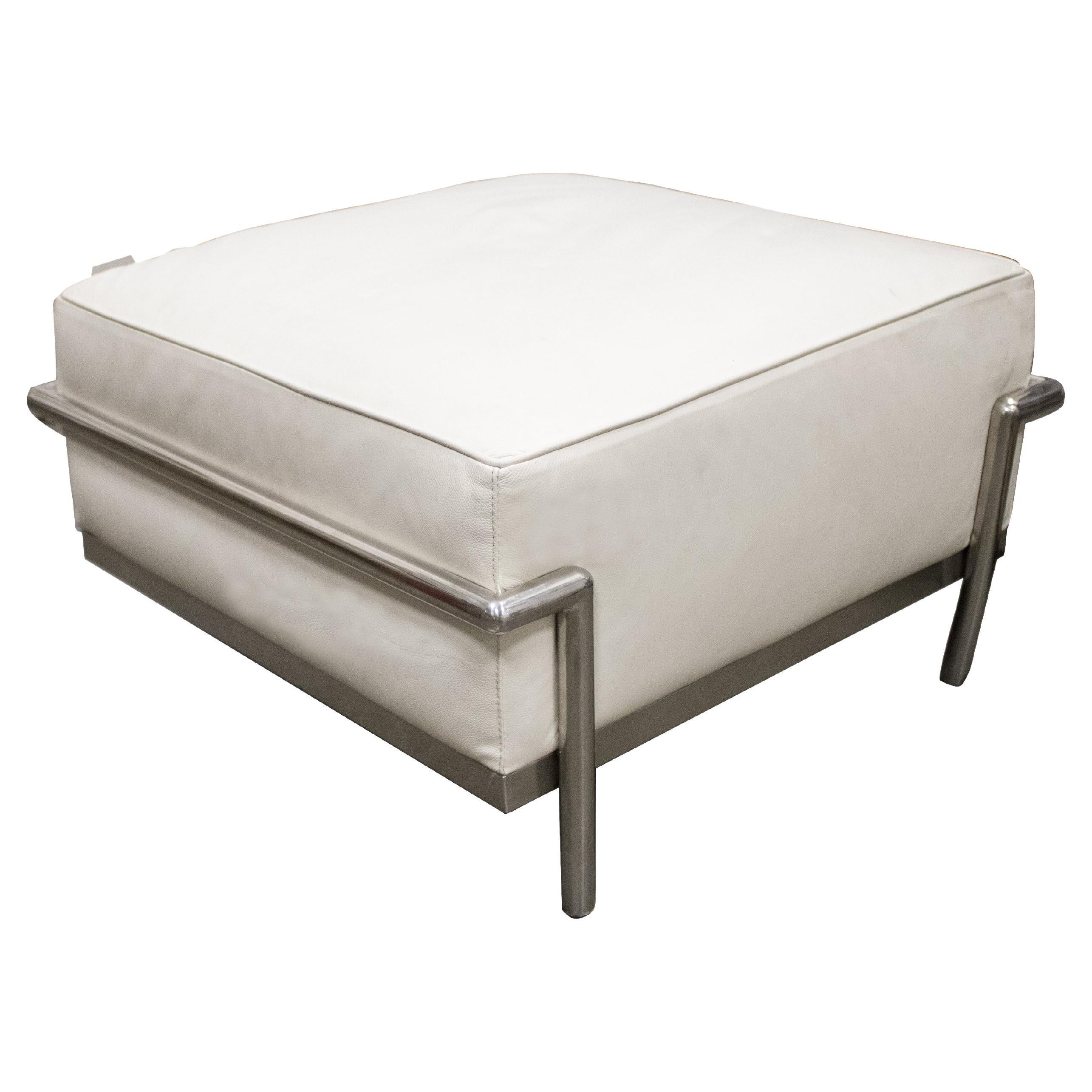 Italian steel ottoman in the style of Mies Van Der Rohe. It consists of a steel structure and four tube legs. The seat is made of foam and reupholstered with white grain leather and a steel tube frame. 