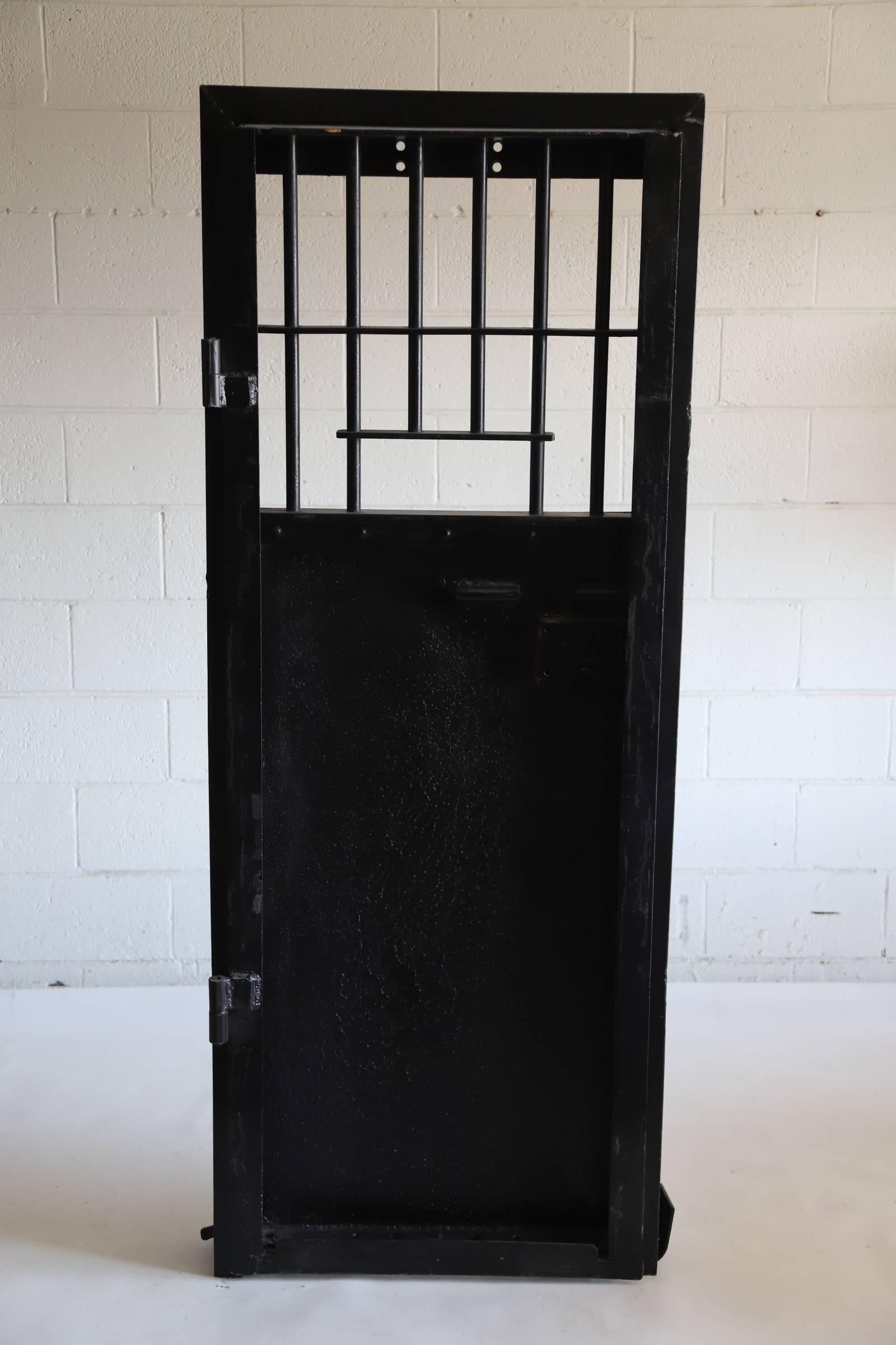 Amazing steel prison door from the Oklahoma State Penitentiary in McAlester OK. This jail house door is still hinged and mounted to original ‘C’ channel door frame. This door/frame is extremely heavy and would make the most wonderful wine cellar