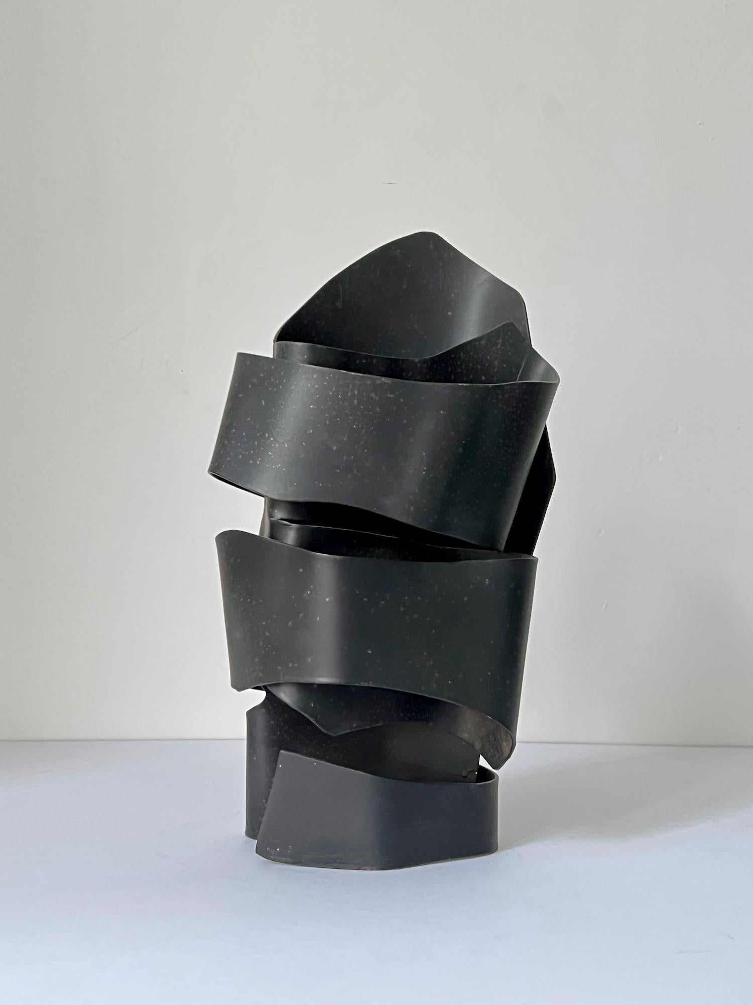 Abstract steel sculpture, in the form of a helmet; from the estate of the artist June Barrington-Ward (1922-2002) and attributed to her. England 1970s. Unsigned.

Good original condition with some signs of age-appropriate wear including small rust