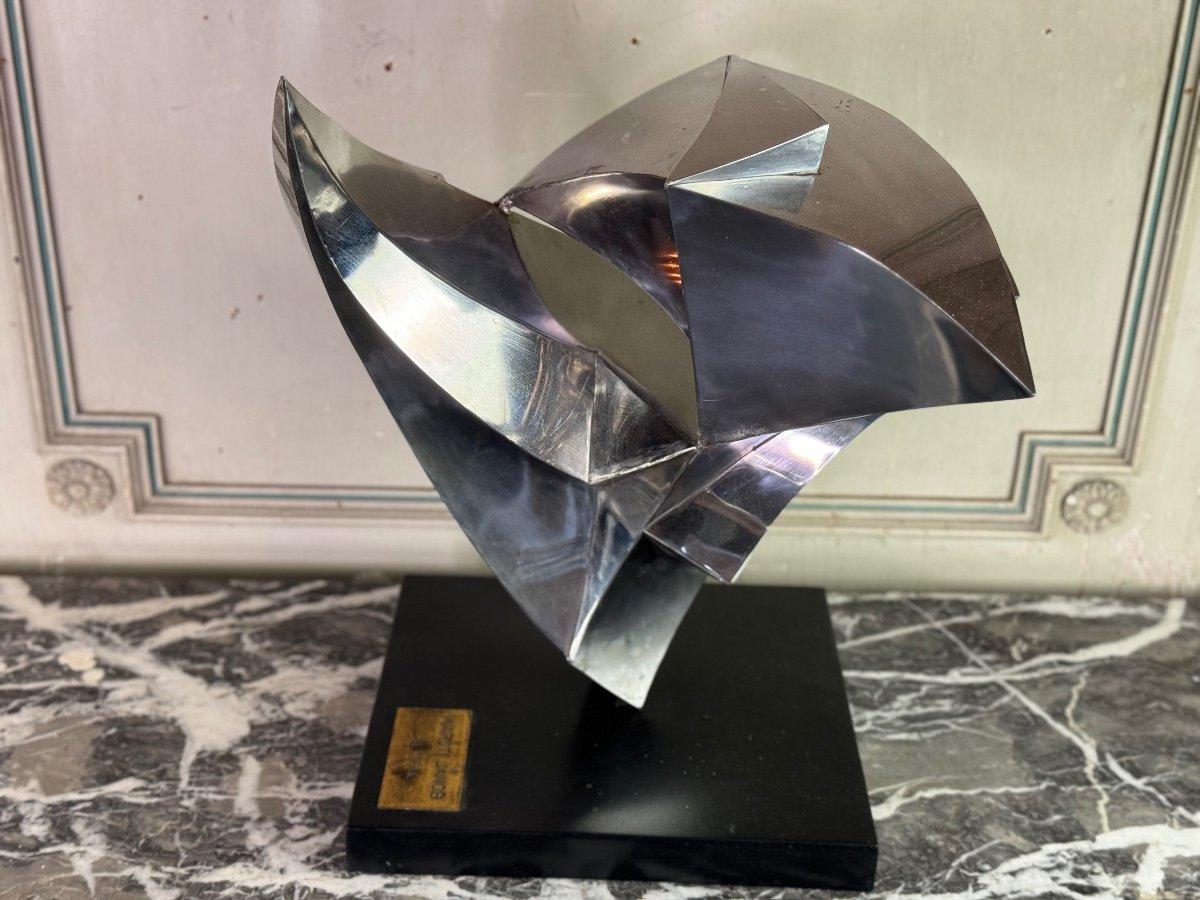 Steel sculpture, Janos Maróti, Hungary, 1984

Material: Chromium
Length: base 32,5 x 29,5cm
Width: 44,5cm
Height: 48,5cm