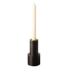 Candelabro simple de acero de Radu Abraham