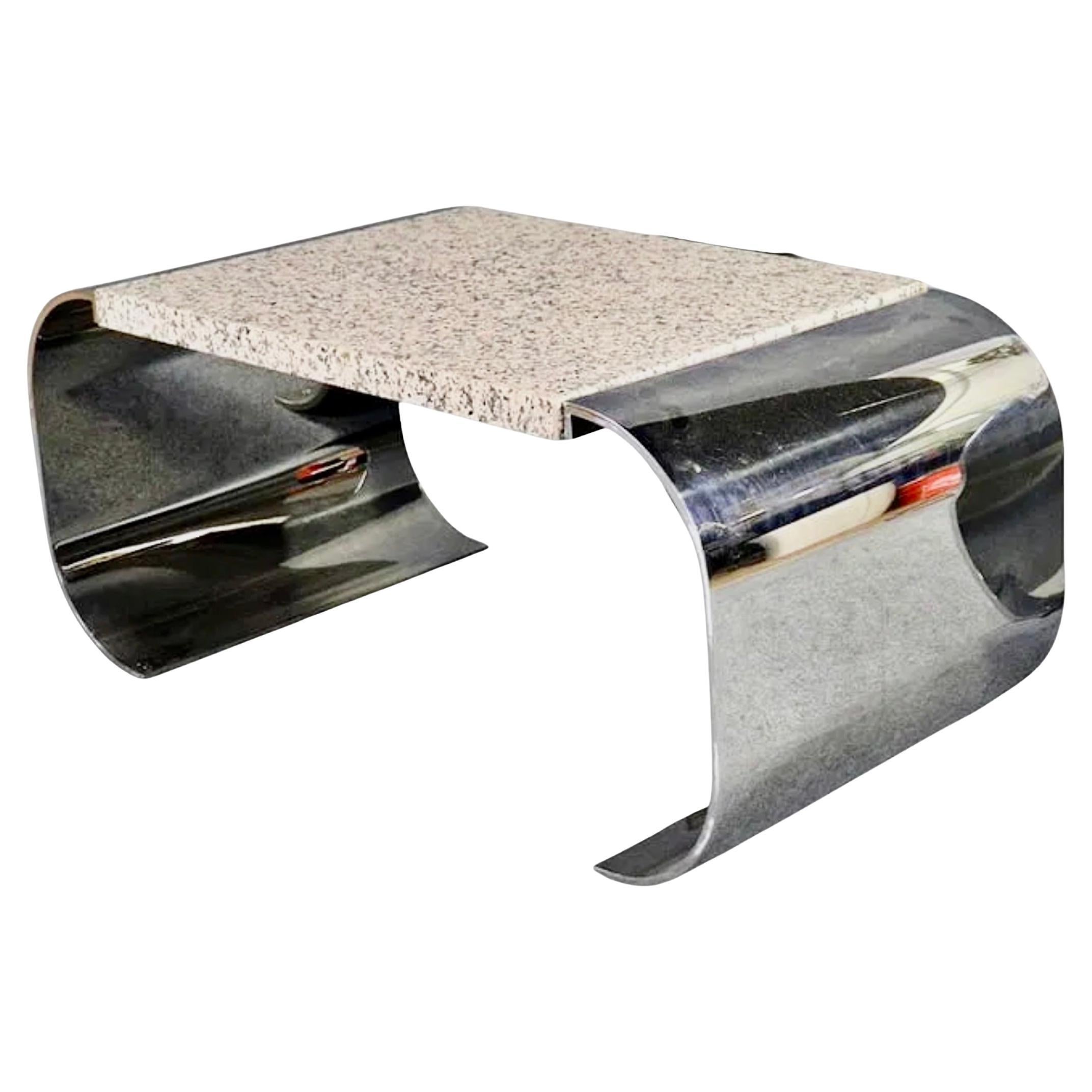 Tisch aus Stahl und Stein von Brueton