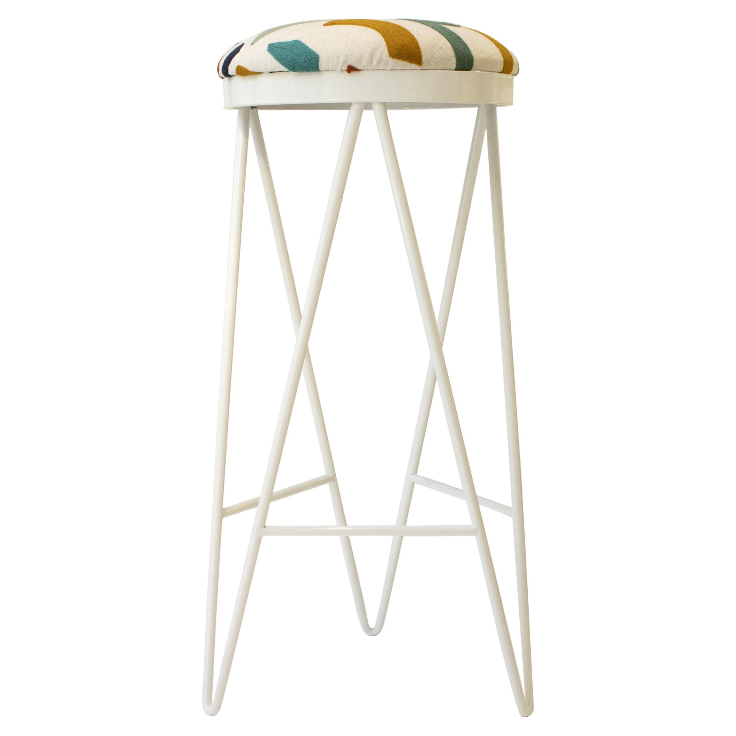 Contemporary stool designed by ikb191 studio. It consists of a Steel structure lacquered in white, and a foam seat, upholstered in beige cotton with a linen embroidered pattern. Manufacture in Spain 2022.

