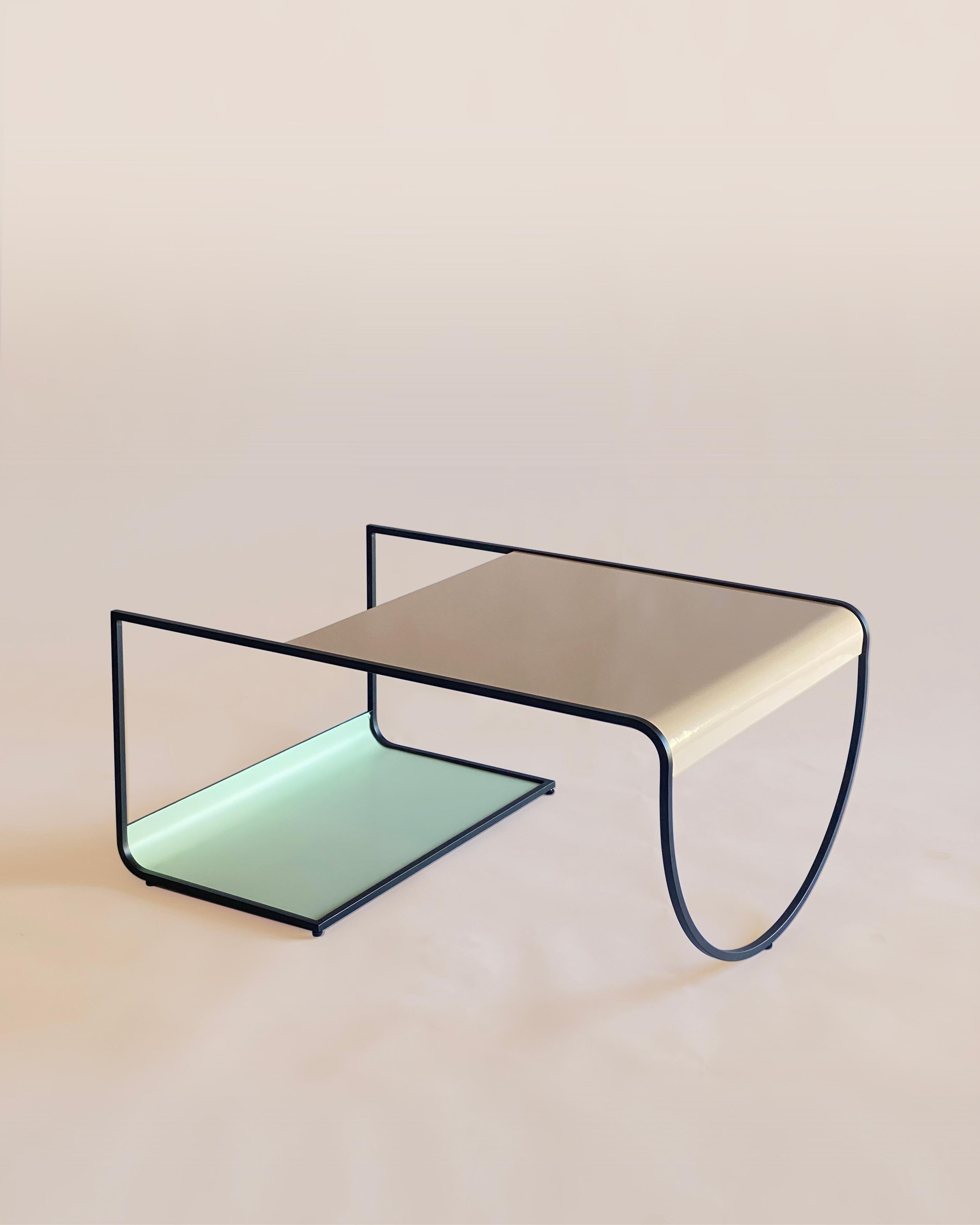 SW coffee table by Soft-geometry
Materials: Steel
Dimensions: 36 x 24.5 x 17” H

Simple, playful geometries form the light and fluid sw geometric coffee table in powder coated steel. Perched on an arched-belly base on one side and a rolled rack