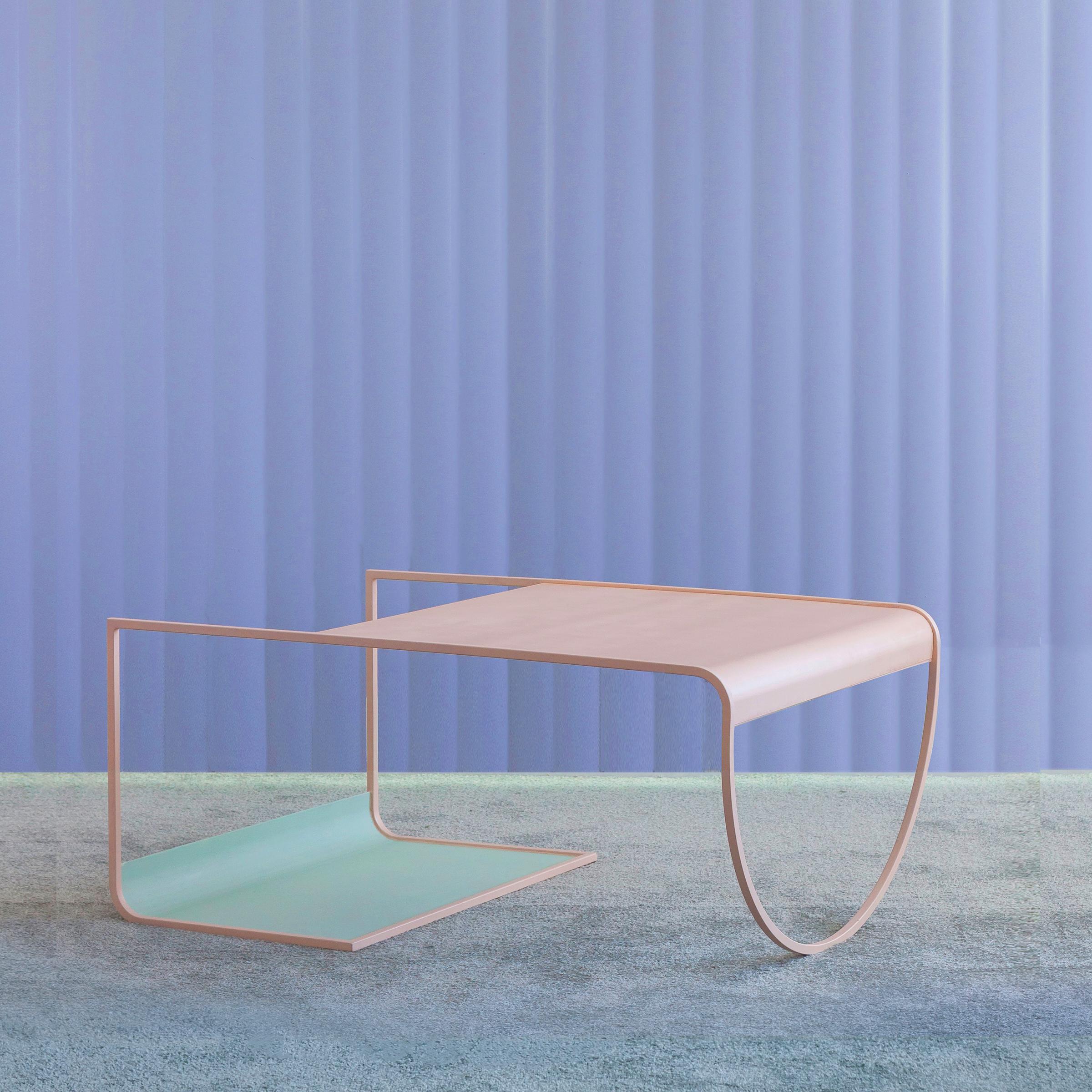 SW coffee table by Soft-geometry
Materials: Steel
Dimensions: 36 x 24.5 x 17” H 

Simple, playful geometries form the light and fluid SW geometric coffee table in powder coated steel. Perched on an arched-belly base on one side and a rolled rack