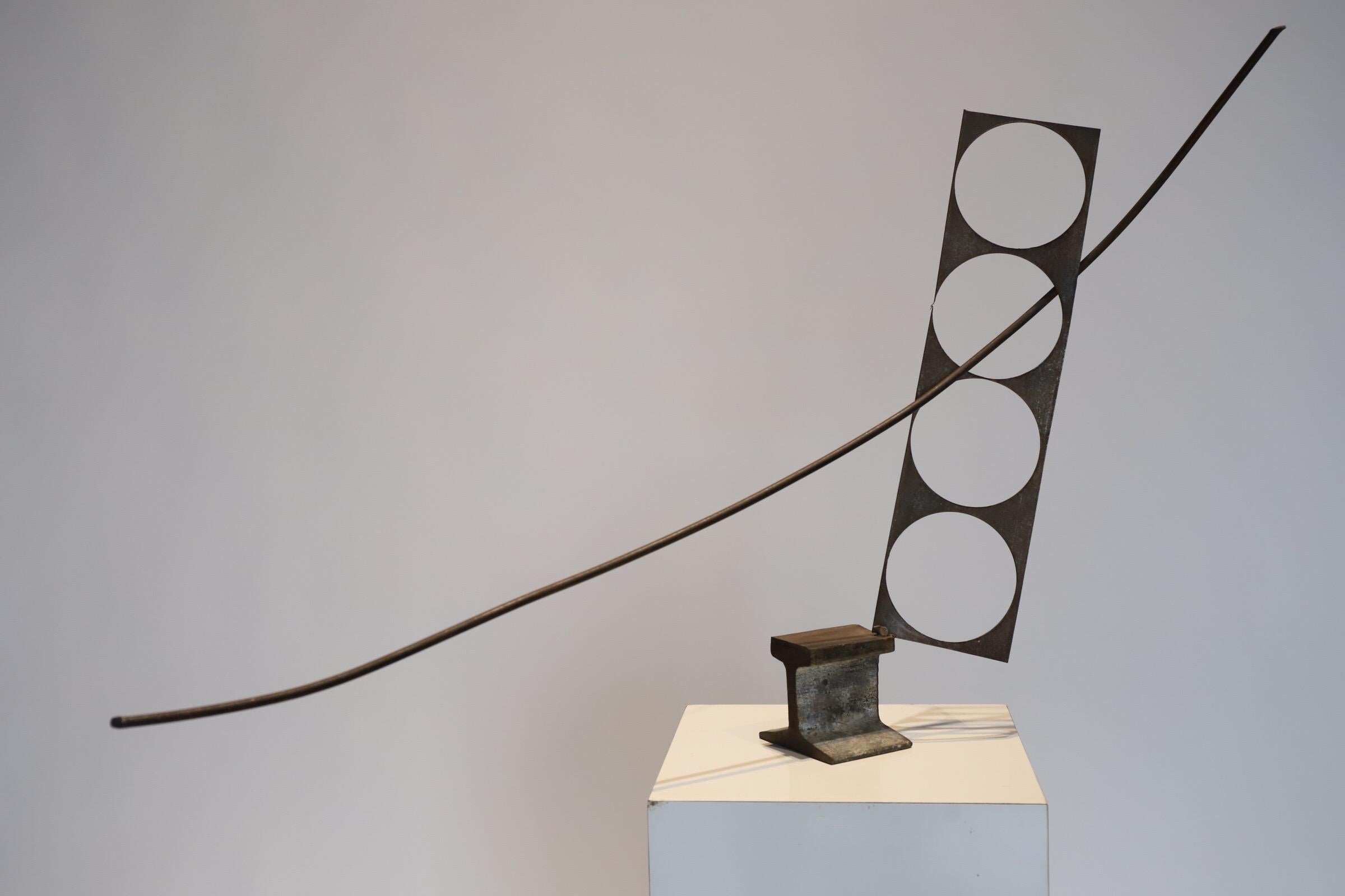 Found object abstract steel table top sculpture by Colorado artist. 

Photographed with Bertoia side chair and Eames LTW for scale.