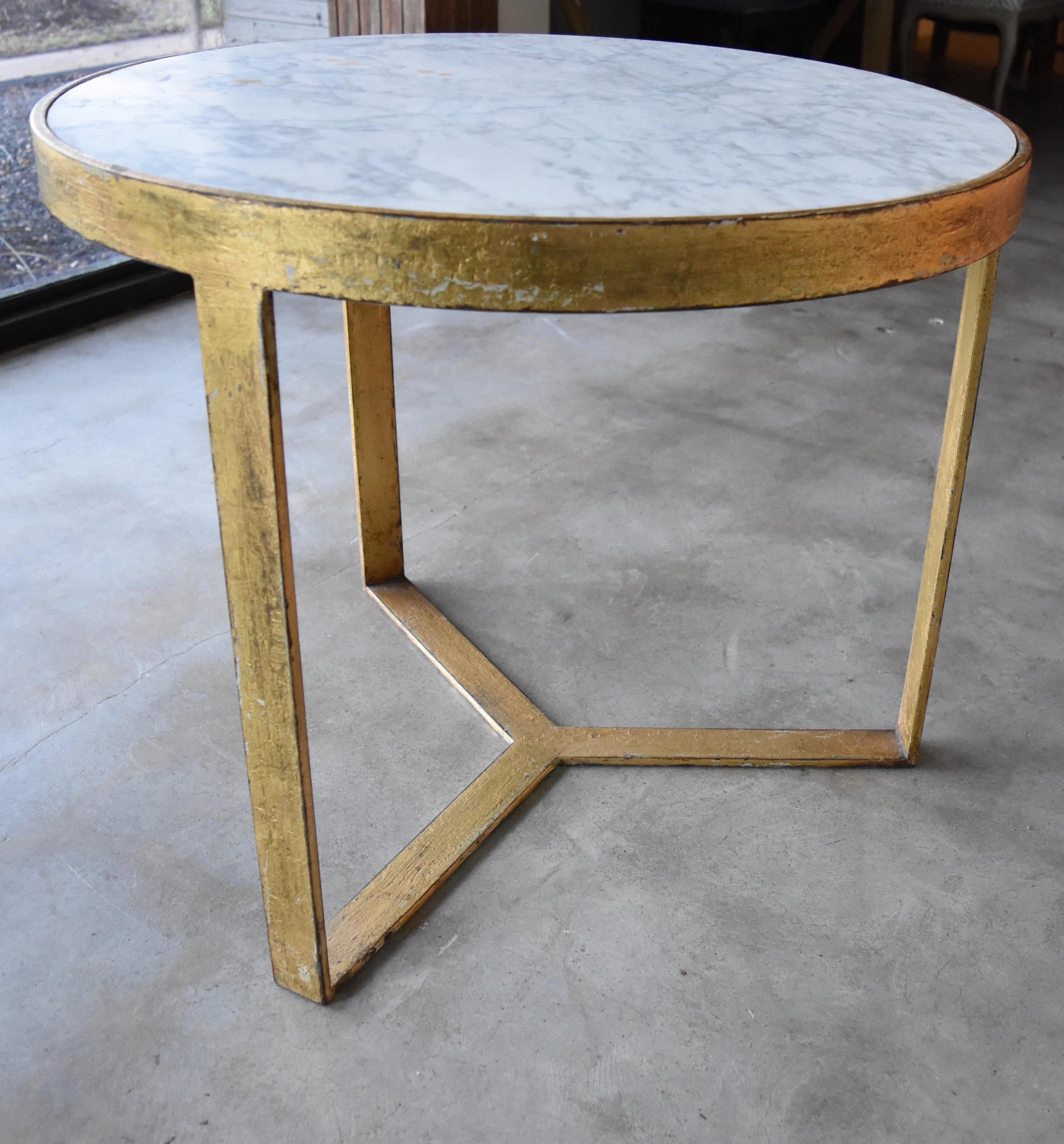 l have always loved handmade furniture. This is my little side table that we had made out of steel and gilt overlay. We find old marble and have it inset as the top. It's a very heavy solid table not easy to pick up alone. I wanted very well made