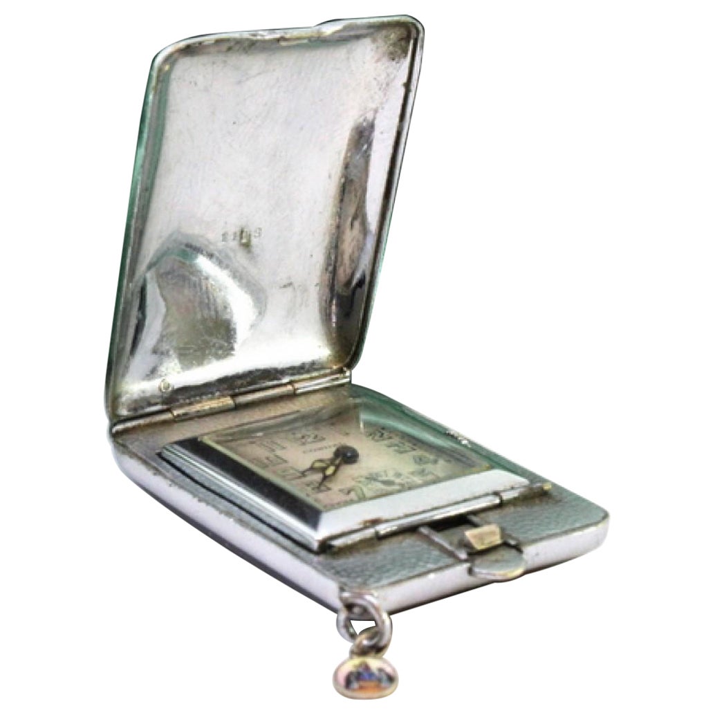 Steel travel watch, Condal brand, with mechanical movement and suspension ring in vendita