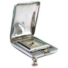 Steel travel watch, Condal brand, with mechanical movement and suspension ring