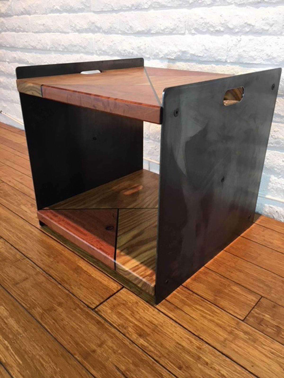 Steel, rosewood, eucalyptus wood side table designed, produced, and made by master wood artist and designer Scott Mills who only uses reclaimed (deadfall or storm downed trees) in the pieces he designs and produces. This piece solid. No veneer.