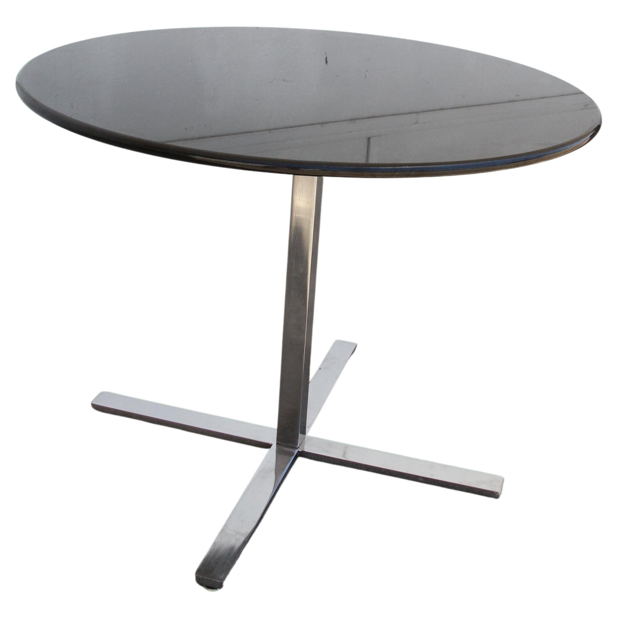 Steelcase 38” Diameter Round Granite Table with Stainless Base 
 
Modern mid century elegant table with 4 star base. 