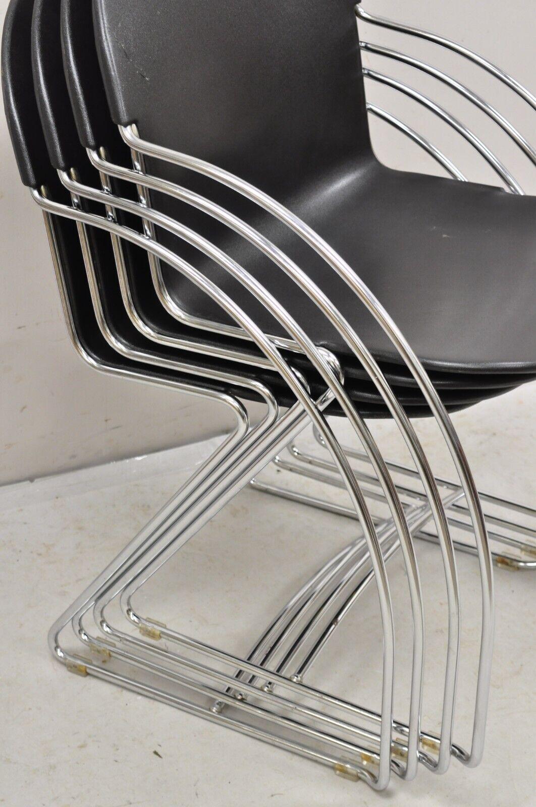 Steelcase Tom Grasman Chrome Frame Black Molded Plastic Stackable Chair Set of 4 In Good Condition For Sale In Philadelphia, PA