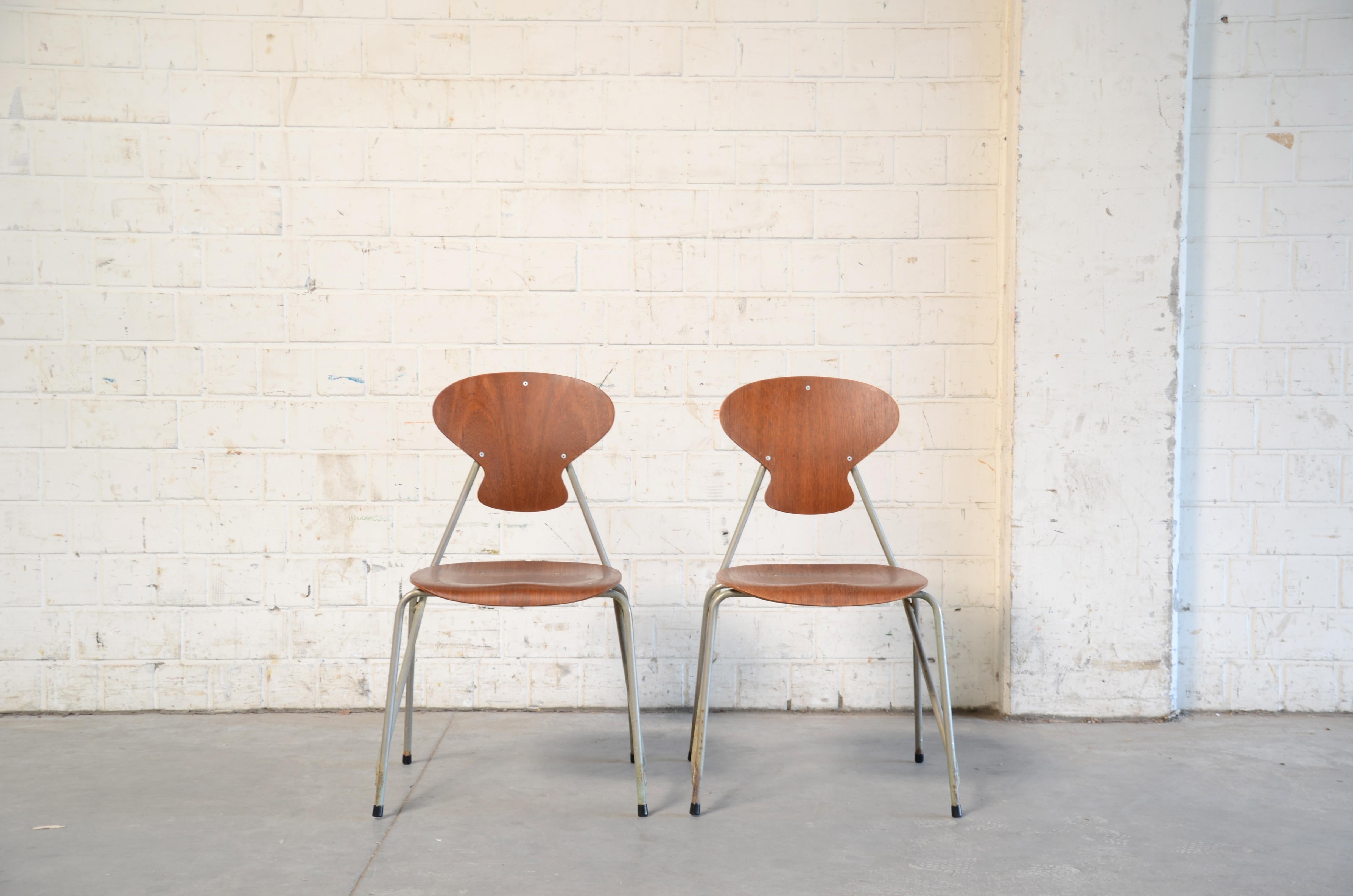 
Vintage teak chairs by Steen Eiler Rasmussen & Kai Lyngfeldt Larsen for Danbork.
Designed 1954 for the school in Rungsted Denmark.
Set of 2.