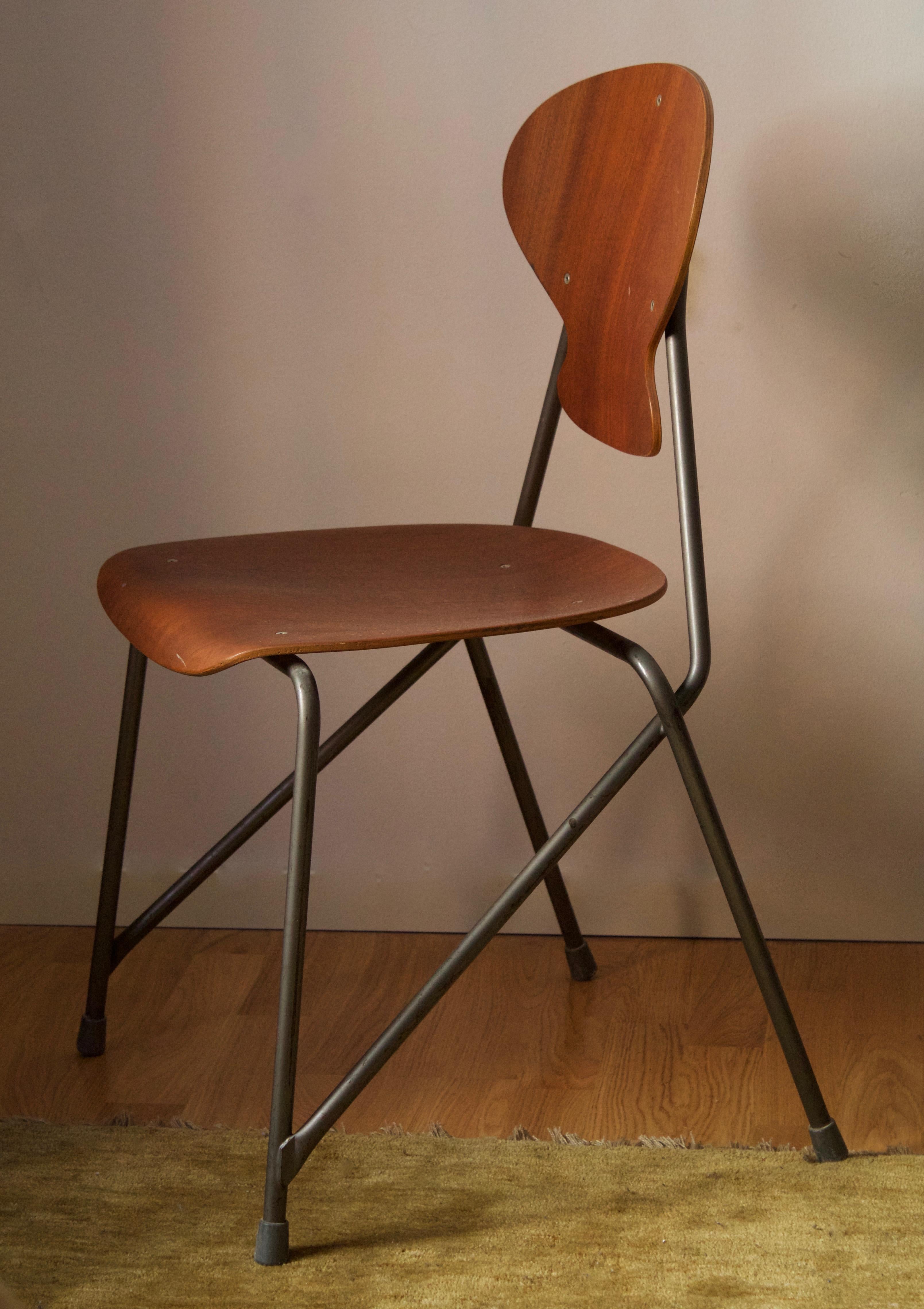 A chair designed by important Danish architect Steen Eiler Rasmussen in partnership with product designer Kai Lyngfeldt Larsen. Designed for Rasmussens Rungsted Skole in 1954. Produced by Danbork.

Example from the original interior.