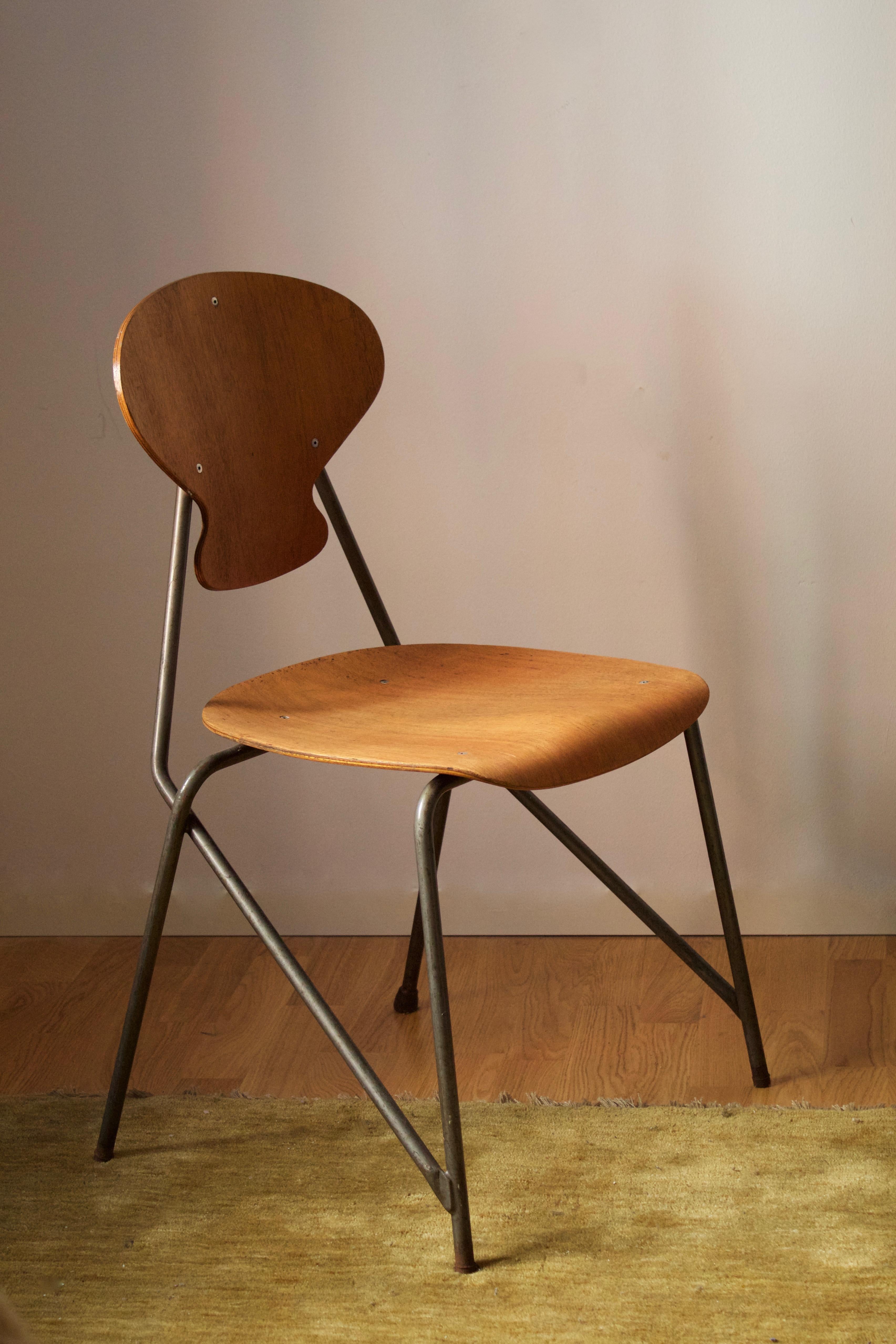 A chair designed by important Danish architect Steen Eiler Rasmussen in partnership with product designer Kai Lyngfeldt Larsen. Designed for Rasmussens Rungsted Skole in 1954. Produced by Danbork.

Example from the original interior.