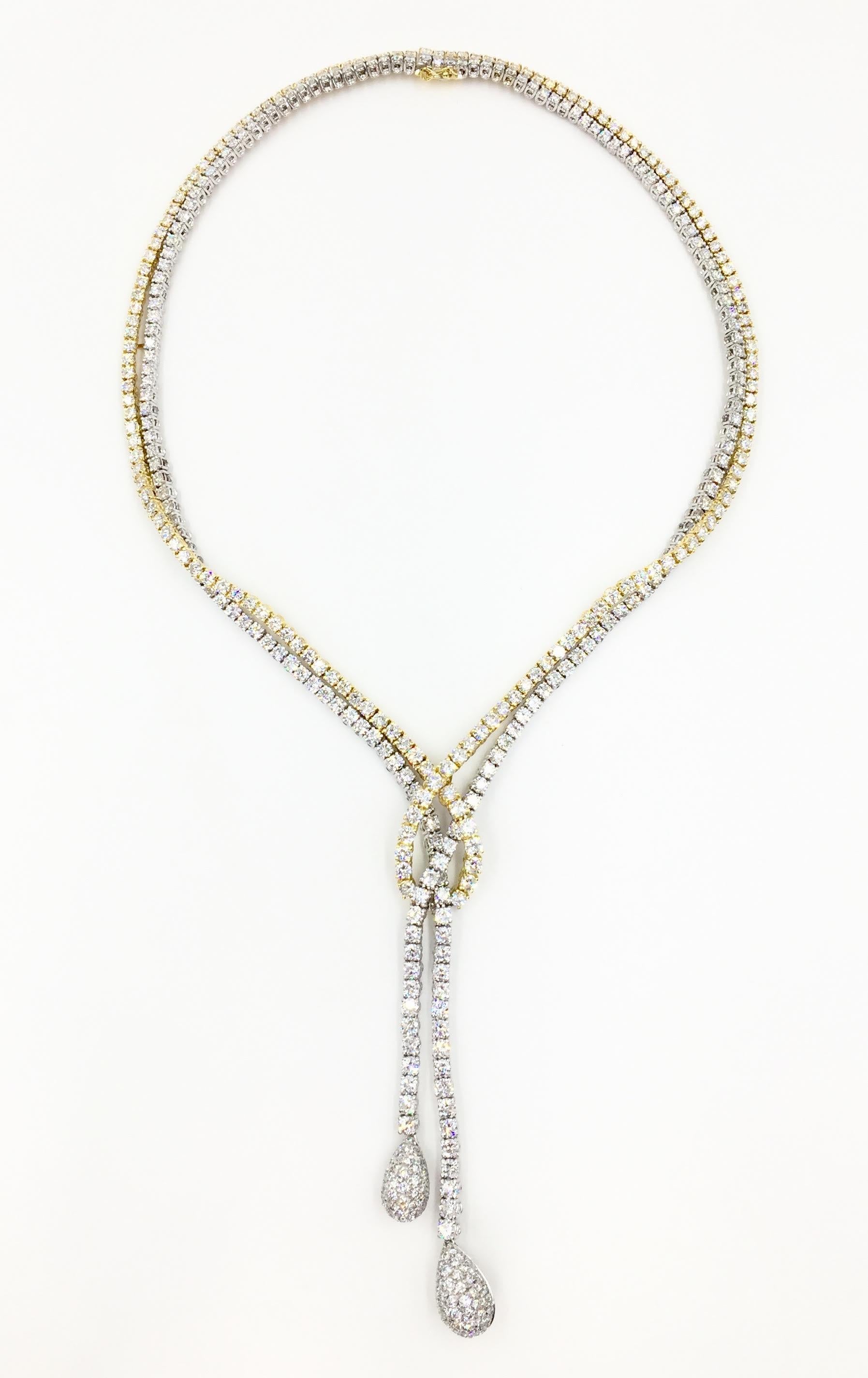A stunning and sophisticated statement piece by renowned Italian designer, Stefan Hafner, is exquisitely set with a total of 21.52 carats of high quality round brilliant diamonds, approximately F color, VS clarity. A yellow gold strand is expertly