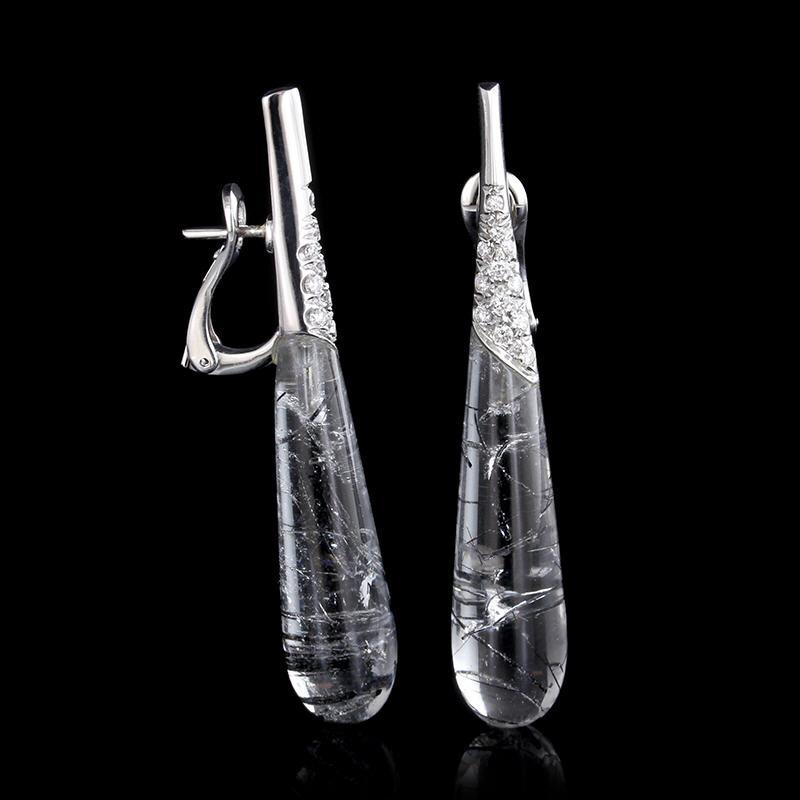 Stefan Hafner 18K White Gold Tourmalated Quartz and Diamond Earrings. The earrings are set with 24 full cut diamonds, approx. total wt. .20cts., G color VS clarity, and two tourmalated quartz teardrops, length 2