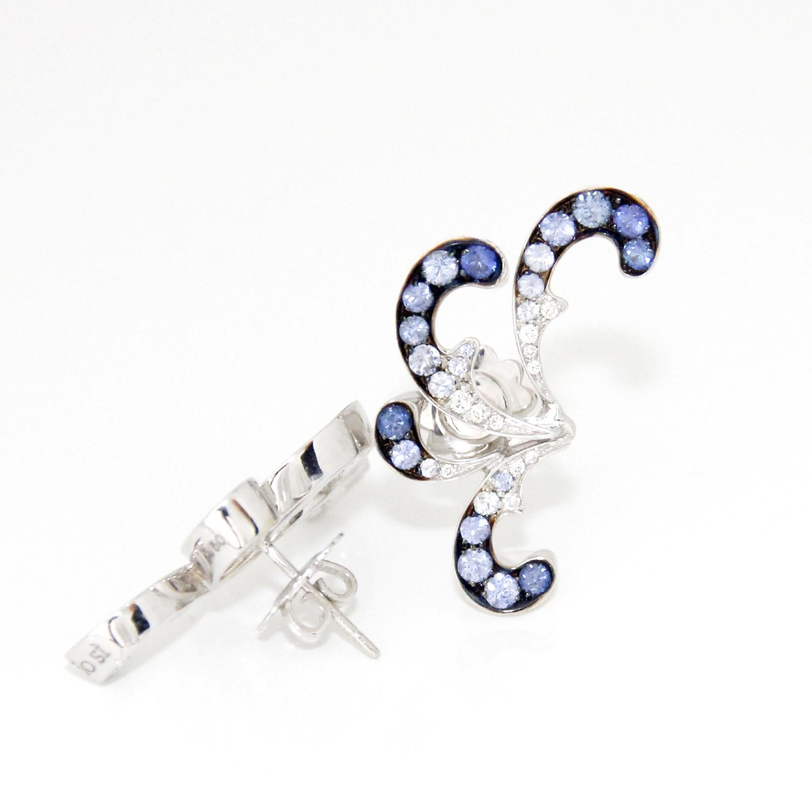  Stefan Hafner 18K White Gold, Diamonds and Blue Sapphire  Earrings
Diamonds 0.24ctw
Sapphires 2.79ctw
Retail $9,400.00