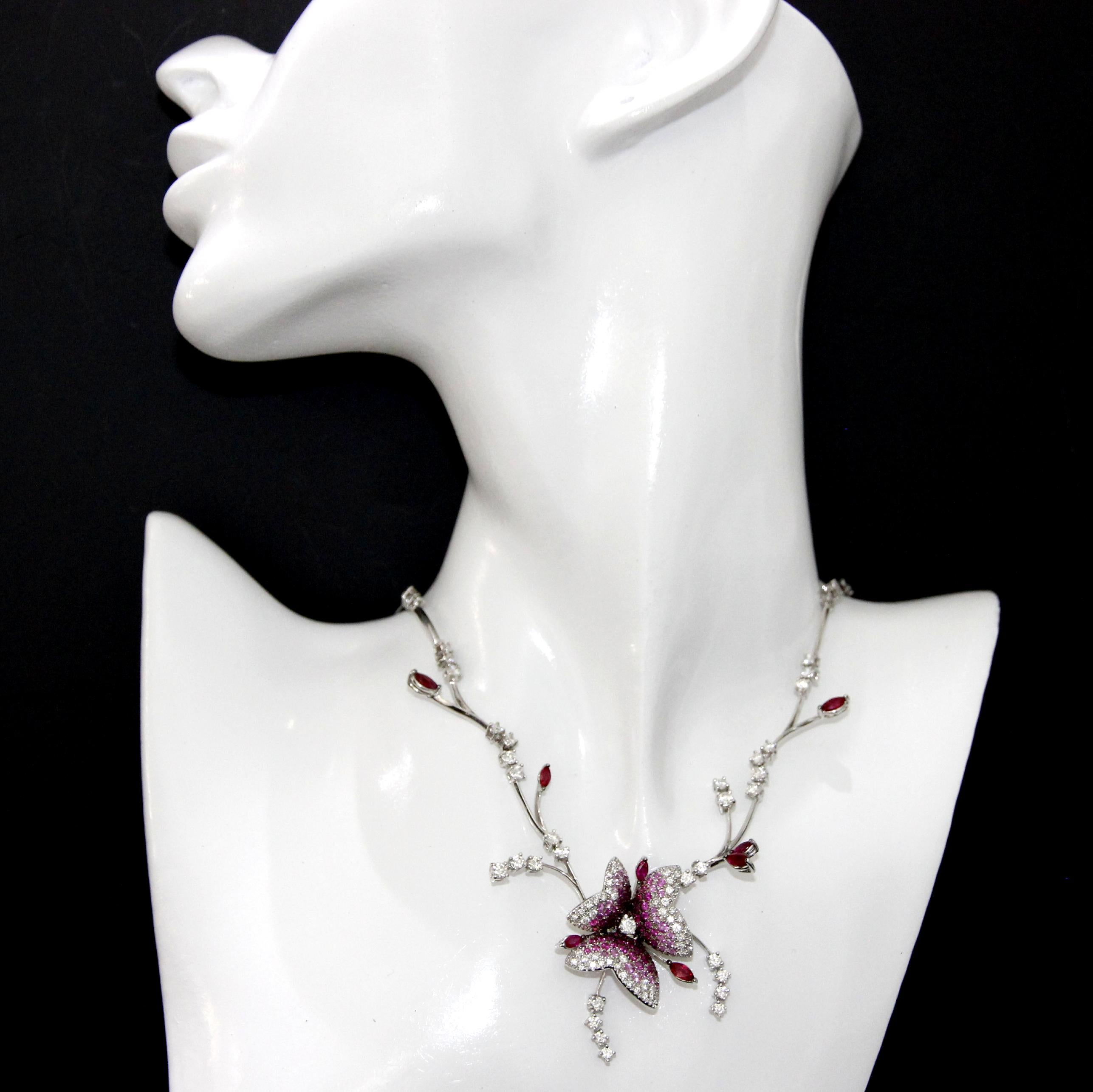 Stefan Hafner 18k White Gold Diamonds, Ruby and Pink Sapphires Flower Necklace.
Diamonds 4.73ctw
Pink Sapphires 1.33ctw
Ruby 2.3ctw
Length 14