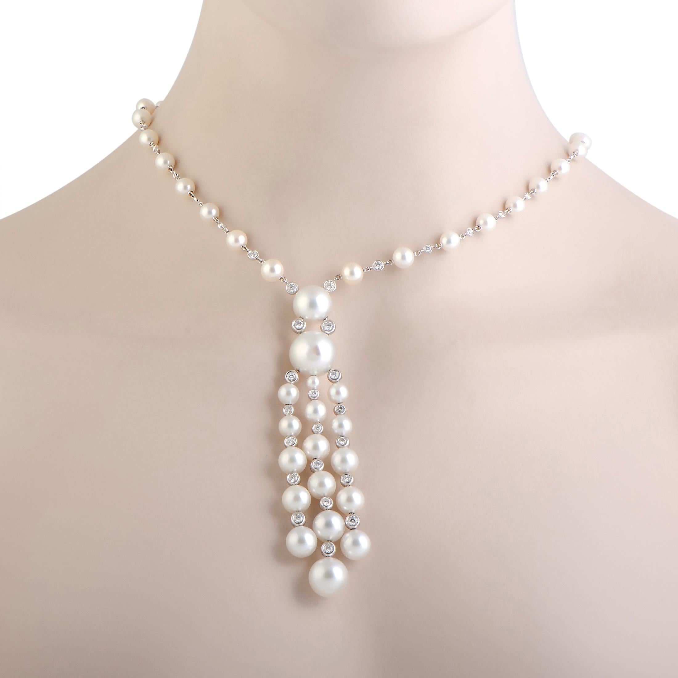Set against the luxurious backdrop of prestigious gold, the scintillating white diamonds and the sublime white pearls in this gorgeous jewelry piece complement one another in an enchantingly feminine manner. The necklace is beautifully designed by
