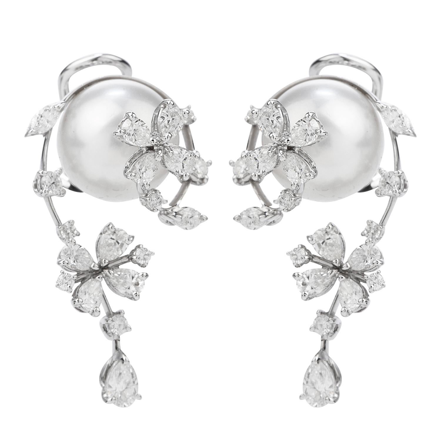Presented by the acclaimed Designer Stefan Hefner, we are delighted to offer these exquisite and delicate Estate Earrings showcasing lustrous pearls adorned with brilliant diamonds.

A floral motif, with movable flower accents - crafted in 18K White