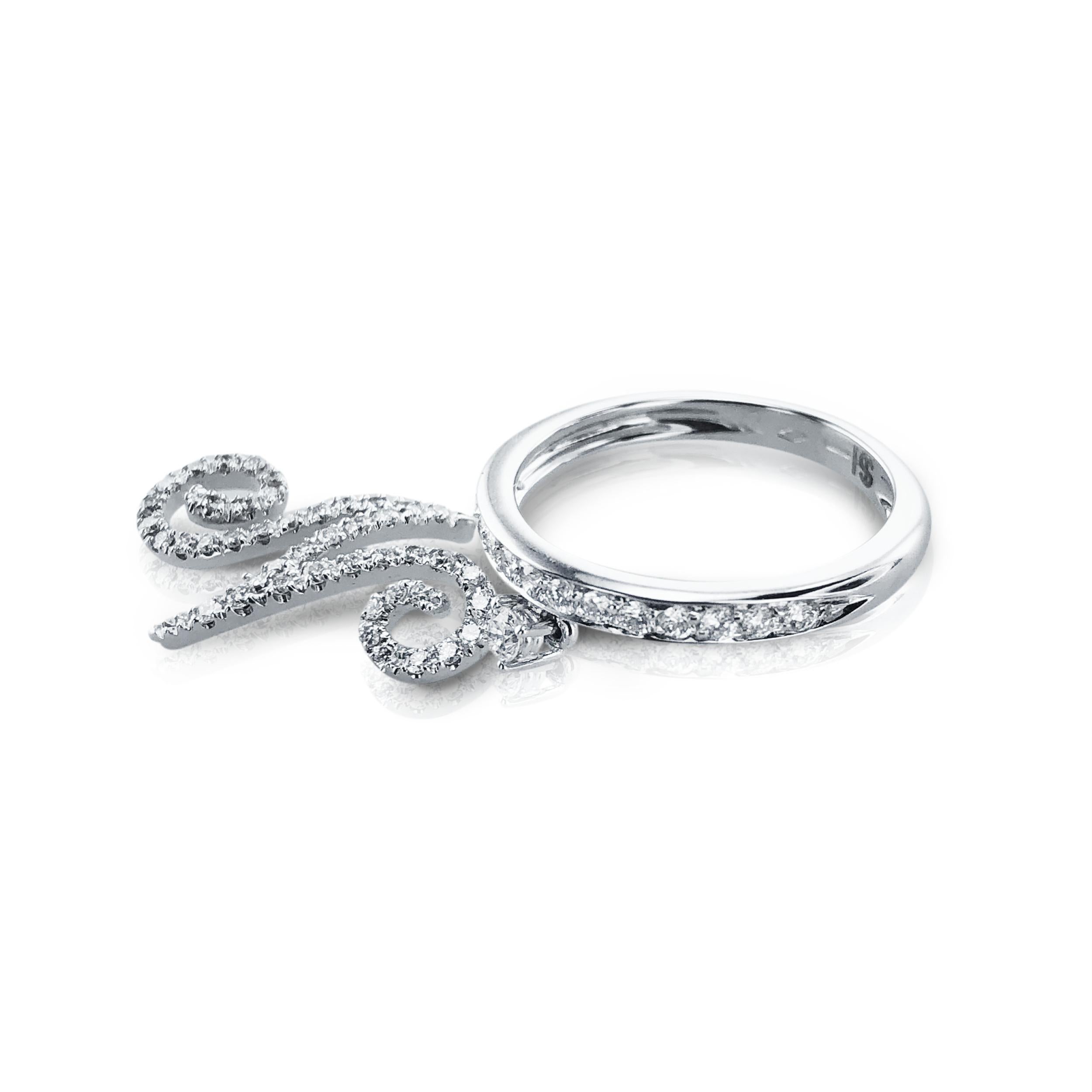 This unique 0.52 Carat Diamond Stefan Hafner Initial 'N' cocktail ring, is initialled with a half Diamond pave dangling 'N' (2cm in length). 

The perfect ring for anyone whose name begins with the letter N, or if the letter holds a sentimental