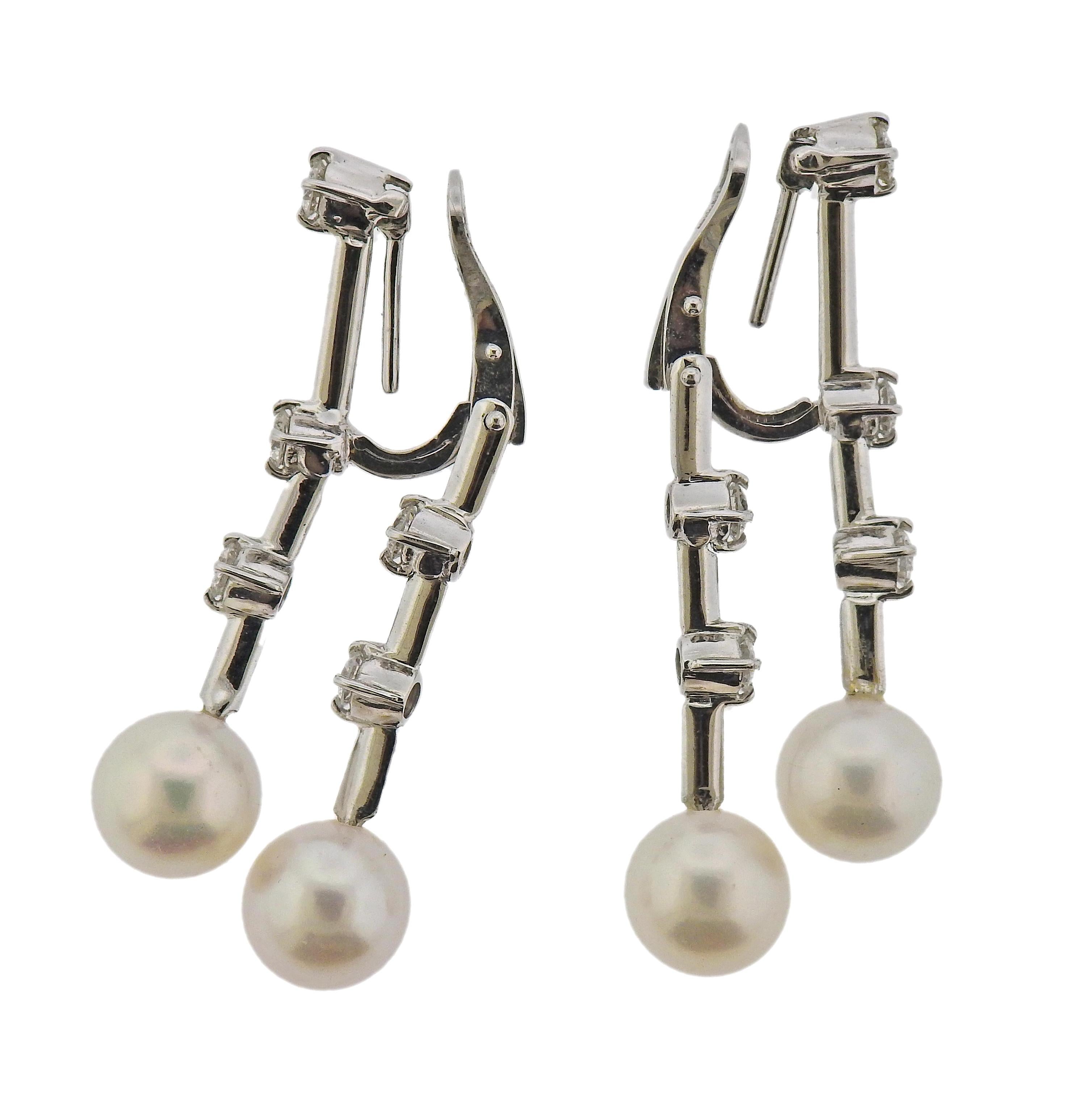 Pair of 18k white gold cocktail earrings by Stefan Hafner, set with 8.7-9mm pearls and approx. 1.06ctw in GH/VS diamonds. Earrings are 42mm long, with collapsible posts. Weight - 11.9 grams. Marked:  SH, 750, Italian mark.