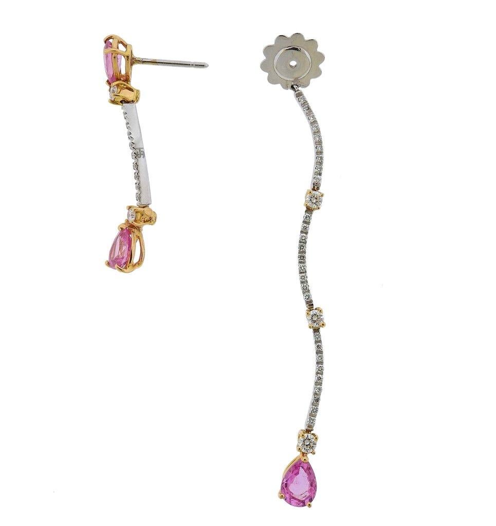 Pair of Stefan Hefner 18k white gold drop earrings, set with approx.0.88ctw in GH/VS diamonds and 3.60ctw in pink sapphires. Earrings are 70mm Long. Total weight 10.9 grams. Marked SH, 750, Italian mark 